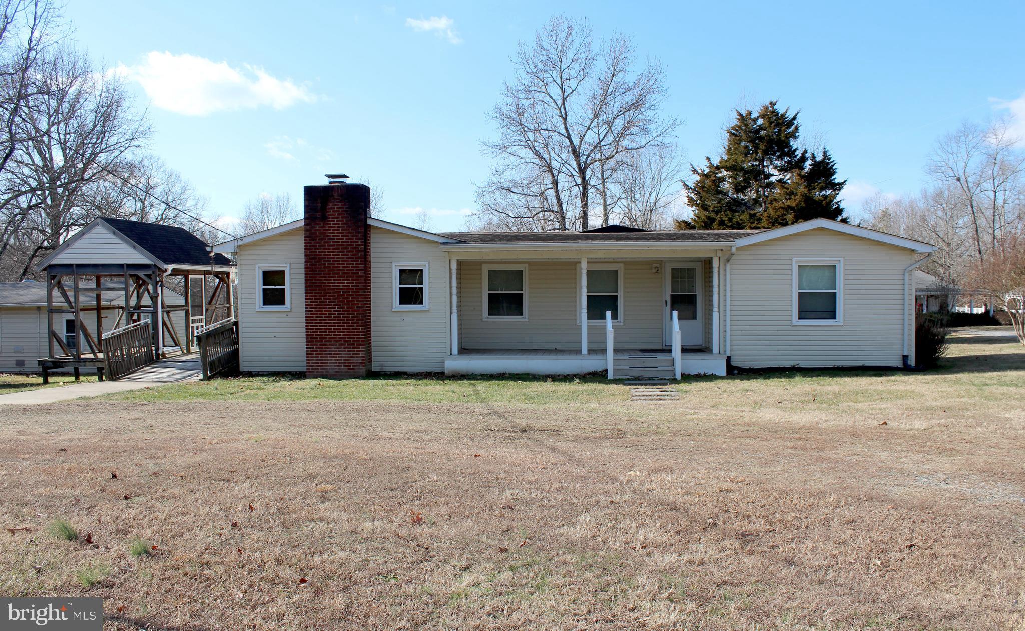 Discover the potential of this inviting rambler, nestled on just over an acre of land in the heart of King George. The flat, expansive backyard offers endless possibilities for outdoor activities, gardening, or simply relaxing in nature. Several sheds and outbuildings, including a unique man cave shed, provide versatile spaces for hobbies, storage, or creative projects. Centrally located with convenient access to local amenities, this home is ready for your updates and personal touches to make it uniquely yours. 
Sellers had home appraised. Priced under appraisal.