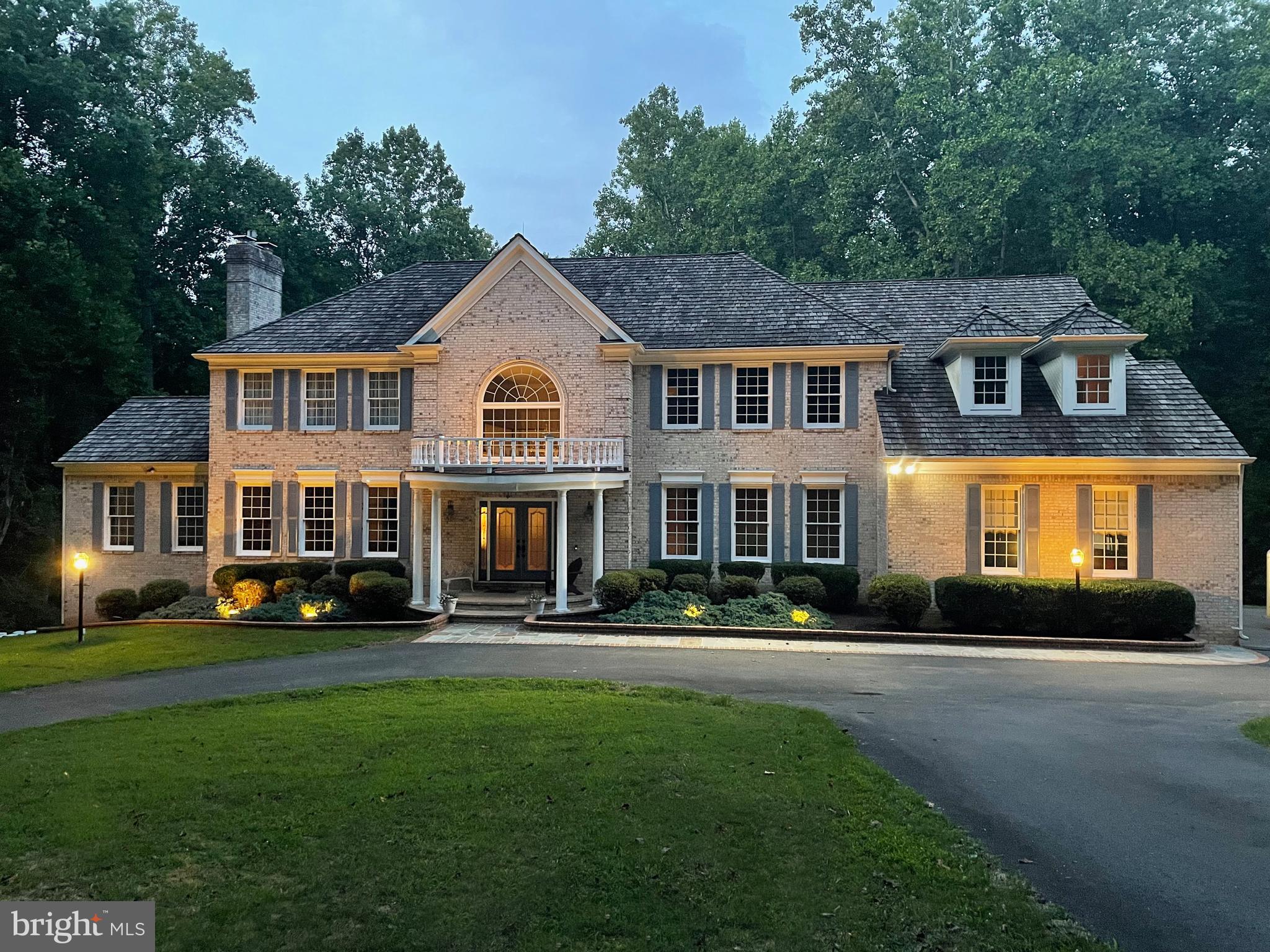 Welcome to this exquisite colonial residence nestled in the highly sought-after Briarlynn Estates community of Fairfax Station. This elegant and beautifully updated home spans an impressive 5,536 square feet, offering luxurious living spaces and exceptional features throughout. Key Features: 4 large bedrooms with each having a full adjoining bathroom. Plus a full bathroom in the finished walkout basement. Main level has two half baths .This home provides ample space for comfortable living. The grand 2-story foyer sets the stage for the rest of the home. Enjoy formal gatherings in the large dining and living rooms, or relax in the inviting great room. The kitchen features granite countertops and two ovens and a gas range making it a chef’s delight.The luxurious master suite is a true retreat, complete with a 300 square foot bathroom with custom cabinetry, heated floors, a soaking tub with heated air bubbles and bluetooth, a walk-in shower with heated floors and seating and a large walk-in closet with an island. The fully finished basement that adds an additional 2277 square feet includes a wet bar, TV room, game room and two extra large rooms as well as ample storage rooms. Outdoor Oasis: Step outside onto the beautiful 2-story deck and discover your private backyard haven. The expansive 5-acre lot boasts a salt water, in-ground pool, providing the perfect setting for outdoor relaxation and entertainment. There is a detached two story garage, with the lower level having a/c and heat and water. This detached garage can be a four car garage or a two car garage with a lower level work room.  Additional Features: Hardwood floors throughout, recessed lighting, and custom built-ins add to the charm and functionality of this home. Located on 5 wooded acres within the esteemed Sangster/ Lake Braddock Fairfax County Public Schools district, this property offers a blend of elegance, comfort, and convenience. Don’t miss the opportunity to make this stunning home yours. Contact us today for a private showing!