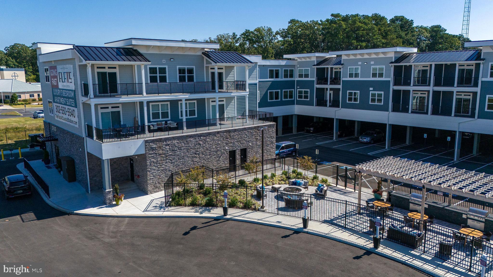 FLATS AT COASTAL STATION - Residential