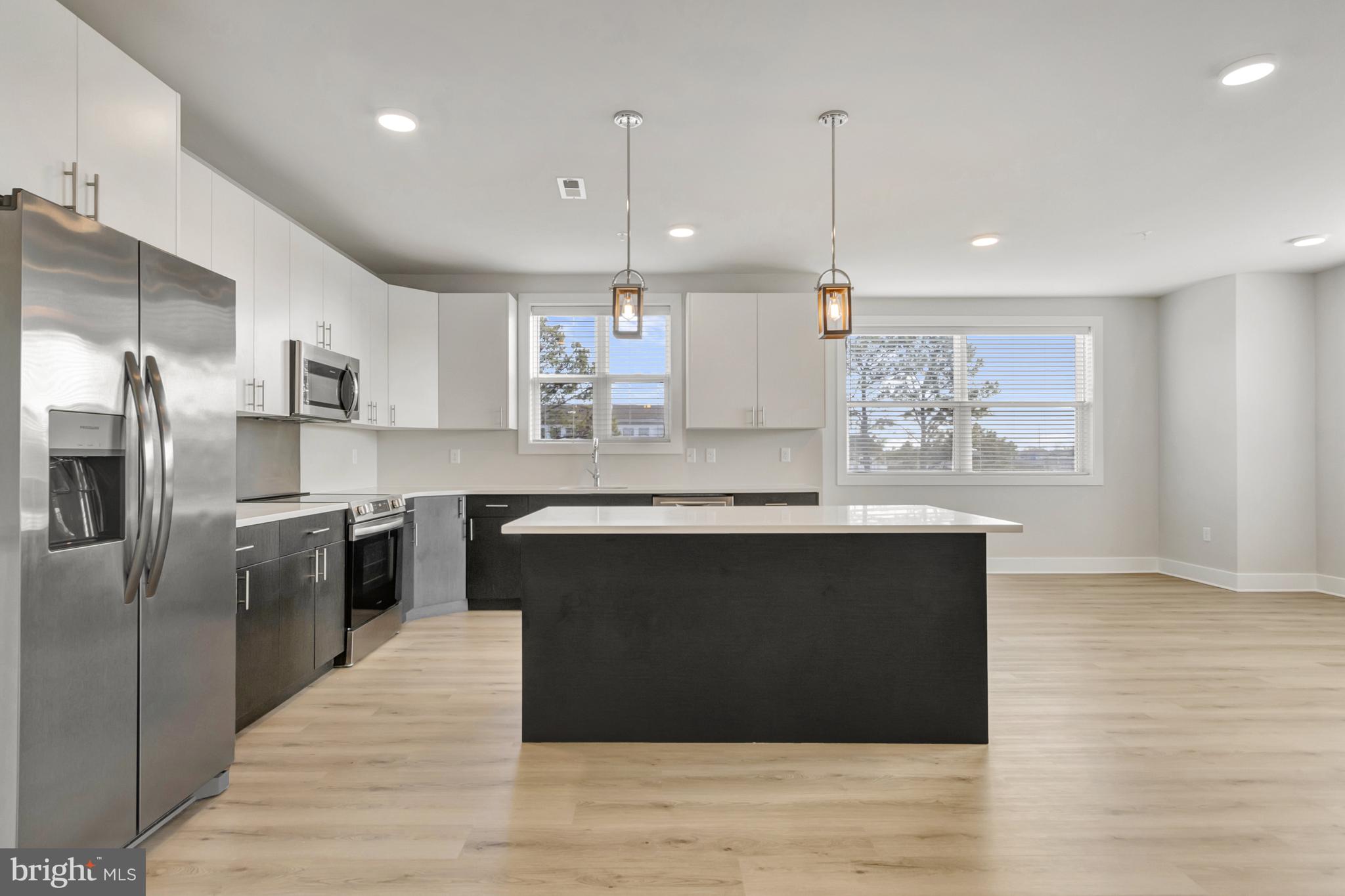 FLATS AT COASTAL STATION - Residential