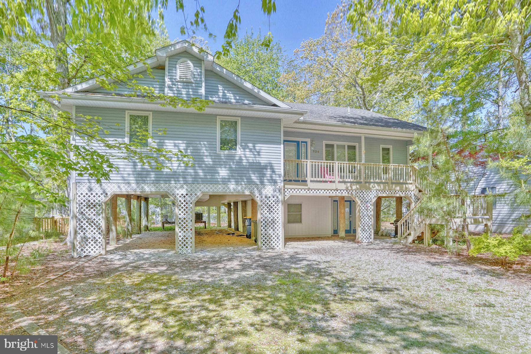 Custom-built coastal retreat located just minutes from the beach in the amenity-rich community of Bethany West! Beautifully maintained and thoughtfully designed, this professionally furnished home offers the perfect blend of comfort, style, and convenience, featuring three distinct living areas and expansive outdoor spaces ideal for entertaining and relaxed coastal living.

The open and airy floor plan welcomes you with vaulted ceilings, gleaming wood floors, and a spacious great room accented by a fireplace and French doors leading to an expansive rear deck and screened porch. The well-appointed kitchen features granite countertops, abundant cabinetry, and a large breakfast bar with seating, perfect for casual dining and gathering with family and friends.

Designed to comfortably accommodate family and guests alike, the first floor includes a media room and full bath, while the second floor hosts the main living area, primary suite, and two additional bedrooms. The third floor offers two more bedrooms along with a spacious loft-style family room complete with a pool table, creating the ideal space for entertaining and recreation.

After a day at the beach, enjoy the convenience of an outdoor shower and dedicated storage area for all your beach gear. Offered fully furnished, this turnkey property is ready for immediate enjoyment as a private coastal getaway or a strong rental investment, with 2026 rental income already booked.

Situated on a quiet non-thru street, residents of Bethany West enjoy exceptional community amenities including two swimming pools, four tennis courts, eight pickleball courts, a fitness center, and access to the Assawoman Canal for kayaking and paddleboarding. Walk or bike to the beach, take advantage of the convenient town trolley, or utilize Bethany Beach parking permits for easy access to downtown shops, restaurants, and the boardwalk.