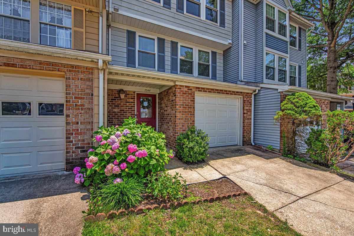 Exceptionally priced interior unit townhouse WITH GARAGE in Greenbelt's sought after Green Holly Woods subdivision. Attends Eleanor Roosevelt HS and easy access to the area's major transportation routes, employment, groceries, restaurants, and more. Garage/Entry level has a large open living space that is currently used as a home office. Upstairs you'll find custom woodwork to include a lovely bookcase by the fireplace making it a perfect place to relax. If you prefer the outdoors, the rear deck backs to the trees offering a peaceful respite from the daily grind. The spacious dining area is located just beyond the kitchen which has an open view to the living and dining areas. Access to the half bathroom is also located on this level. The upper level has 3 bedrooms and 2 full bathrooms with the owner's suite being the largest of the bedrooms with an attached renovated bathroom. It's rare for a townhouse with a garage to come up in Green Holly Woods, here's your chance!