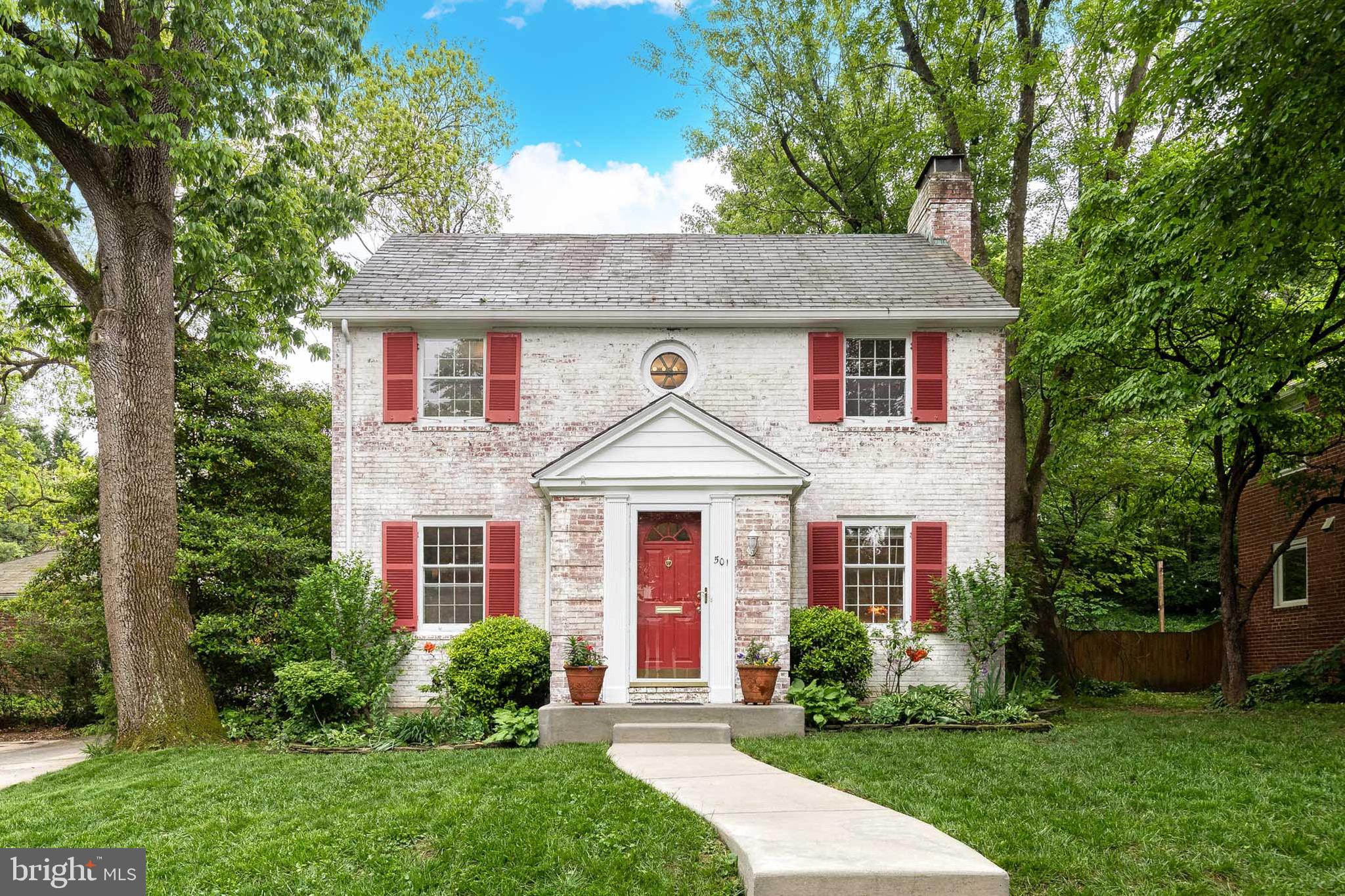 Nestled in the heart of Roland Park, this beautifully maintained brick colonial offers classic charm  and modern comfort. Featuring three bedrooms, one and a half  baths, this home boasts a fully renovated kitchen complete with a premium Wolf range and quartz countertops. The open-concept kitchen flows seamlessly into the dining room which leads into the spacious family room adorned with a wood burning fireplace, built-ins, and hardwood floors. Outside, you will find the picturesque backyard, featuring a covered patio, hot tub, gardens, and ample yard space perfect for entertaining or relaxing. Lastly, enjoy the convenience of a two-car garage which makes parking a breeze.