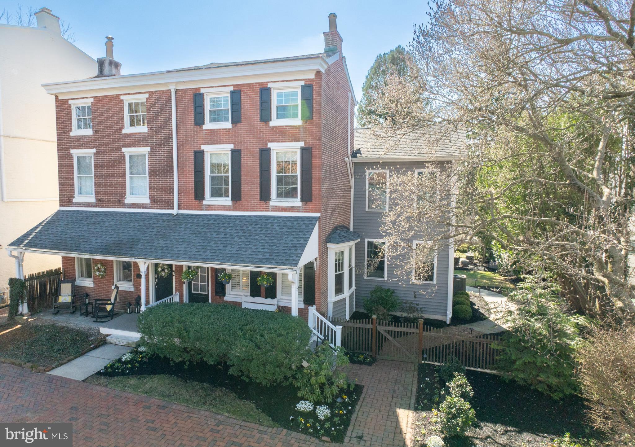 Absolutely Fabulous Magazine Perfect Victorian Twin in West Chester Boro!  The Double Lot makes this home soo very Special... with the 2Story Addition, Sparkling NEW Baths & Custom Kitchen Upgrade being the icing on the cake!  21st Century Sleek Modern Finishes! a one minute stroll to Marshall Square Park!  2875Sqft  4Bedrooms  4.1Baths  .20acres  Finished Lower Level 560 Sqft  2CAR Detached 2Sty Garage   Awesome Architecturals:  Front Porch, 9ft Ceilings, Handsome Hardwood Floors, Extensive Millwork & Built-ins, Front & Back Stairs…oh my, all soo FRESH!  Front Porch, Main Level 1320Sqft Open Concept: Dining Room & Library, Great Room: Dry Bar w/Wine Refrigerator & Woodburning Fireplace, Powder Rm, Back Stairs, THE Kitchen 26X12: GAS 6Burner WOLF Range, LARGE Island seats 5, Custom Paneled Appliances, Refrigerator Drawers, Quartz & Tile, simply maahvelous! Mud Room: Laundry, Dog-Washing Station, BIG Closet.  2nd flr:  Wonderful Owners Suite: Vaulted Ceiling, 2Walk-in Closets, EnSuite Bath: all glass & tile, Princess Bedroom: cool ‘Ladder Slide’ & EnSuite Bath, Bedroom3, Hall Bath.  3rd flr: Bedroom4.  Lower Level 560Sqft: Media Room, Office Area, Full Bath, Storage. Just wait ‘til you see this exceptional twin, a delight around every corner! Fenced, Mature Landscape, Sun Drenched Backyard & Expansive Slate Terrace.  2CAR Det Garage: Stairs to Upper Flr.  Off-Street Parking. The front Porch is just waiting for your wicker furniture & a mint julep! Indescribably DELICIOUS!  Photos do not do this home justice, come discover the magic of our Boro Life Style!