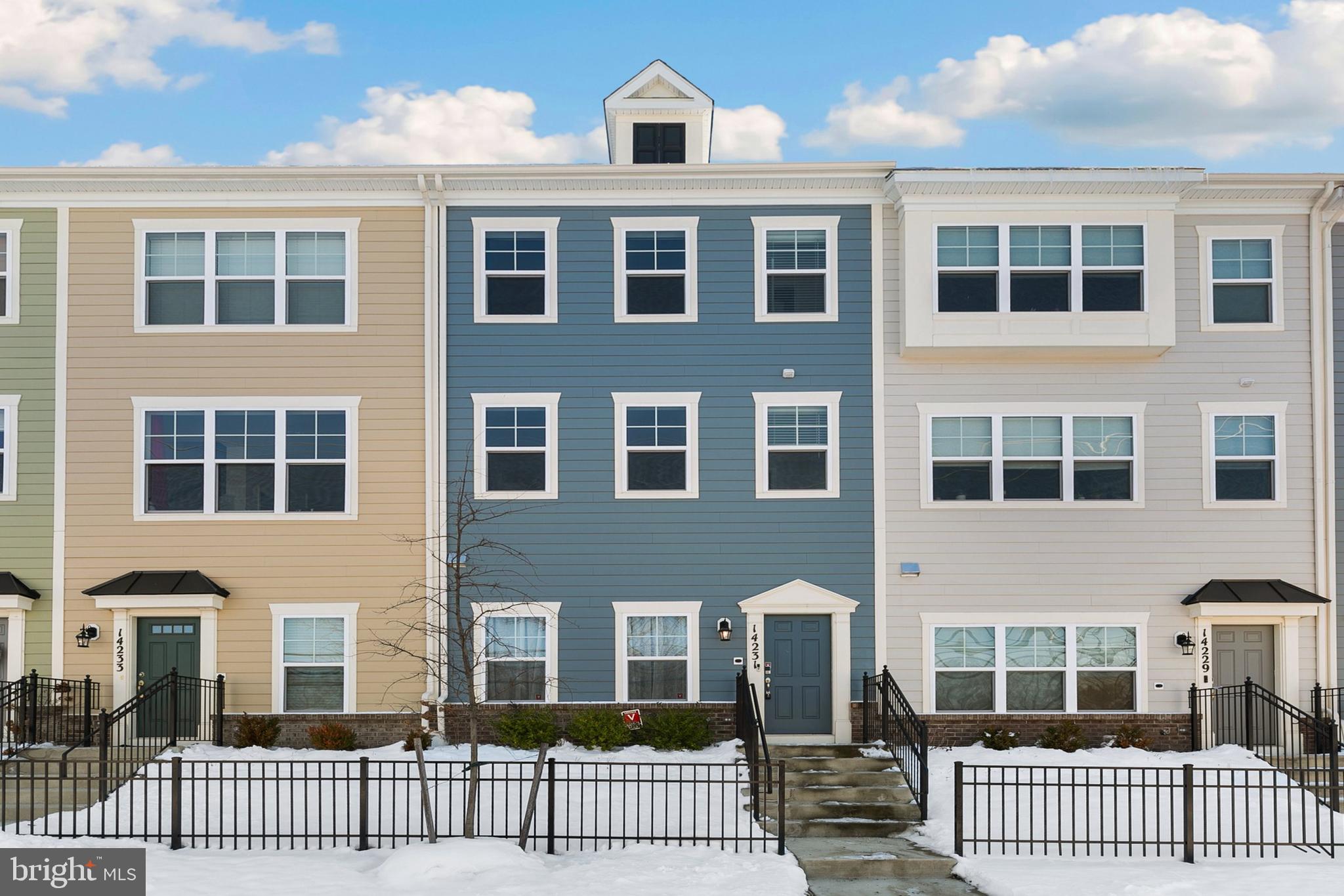 Nestled in the sought-after North Potomac enclave of Rockville, Maryland, this exquisite residence is a masterfully crafted Townhome that seamlessly merges opulence with practicality. Spread across three meticulously finished levels, this dwelling is a sanctuary for both grand gatherings and serene repose. The entry level hosts a home office, complemented by gorgeous luxury vinyl plank flooring , as well as a half bath, closet and access to the garage. Travel up the oak hardwood stairway where the luminous main level is adorned with a gourmet table-space kitchen boasting quartz countertops, GE Profile wifi-enabled stainless steel appliances with gas cooking, and a huge quartz-topped island with an inviting breakfast bar. This entire level is also adorned with beautiful luxury vinyl plank flooring. The family room extends gracefully to a balcony, providing an ideal setting for your morning coffee or evening libations. A powder room and pantry complete this level, ensuring convenience at every turn. Ascending another oak hardwood stairway to the upper level reveals an elegant primary suite, with wall-to-wall carpeting, featuring a serene en-suite bath with a shower showcasing a bench, floor-to-ceiling tile, and a dual vanity. The primary suite further indulges with a ceiling fan and generously sized walk-in closet. Two additional fully carpeted bedrooms, a full bathroom, and a well-appointed laundry room round out this level. Ensuring practicality, the two-car garage with electric opener and keypad provides ample space for your vehicles and belongings and a wifi camera system. Situated in proximity to North Potomac's amenities, including Trader Joe's, shopping, dining, schools and parks, this residence also grants access to community features such as a fire pit, grills, neighborhood park and bike racks. There's also a big green space which is nice for dogs. Enjoy the family-friendly neighborhood with an annual Halloween Parade.  Convenience extends beyond the neighborhood, with easy access to I-270 and the Nancy H Dacek Community Recreation Center is also close by. This property stands as a rare gem, ready to leave an indelible impression. Schedule a viewing today to immerse yourself in the distinctive allure it offers! For convenience extending beyond the neighborhood, there's also the MOCO public library, RIO, Glenstone, downtown Rockville and Rockville Metro station, providing easy access to a DC commuter. These are all 10-15 mins driving distance from the house.