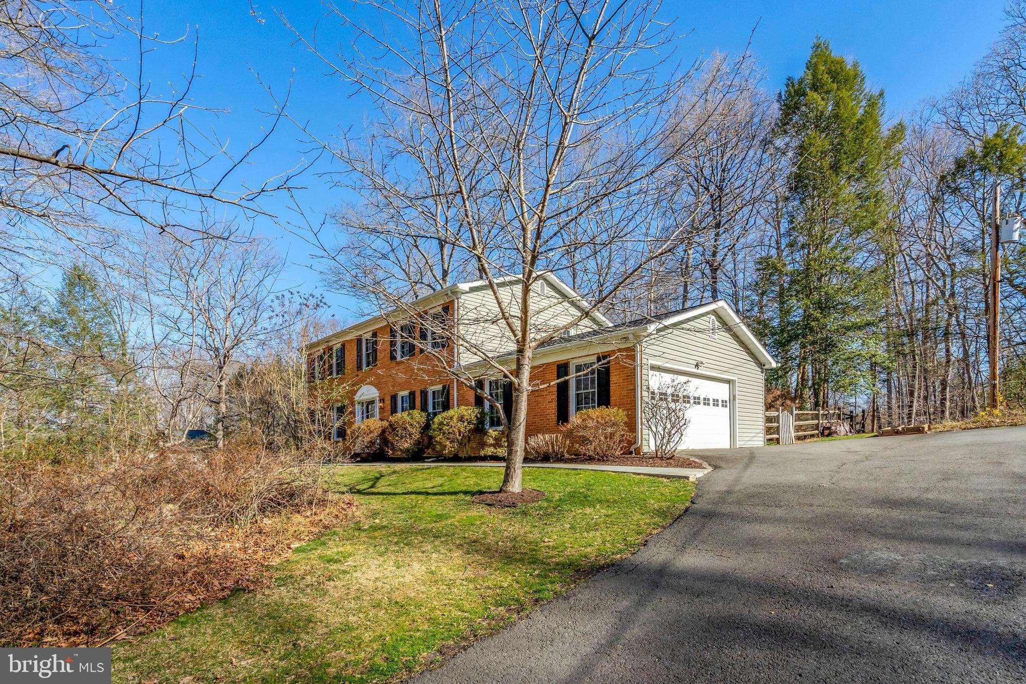 Welcome to this beautiful brick colonial, built in 1973 , situated on 2.36 private acres. With 3,080 square feet of living space, this home offers a blend of classic charm and modern updates.
The large, freshly updated kitchen features professionally painted cabinets, Granite counter tops and stainless steel appliances. Just steps away, the family room boasts a wood-burning fireplace and access to a spacious sunroom.
Upstairs, the primary suite showcases cherry hardwood floors, a beautifully updated en suite bath, and a walk-in closet with organization racks. Three additional bedrooms share a well-appointed hall bath.
The finished basement includes upgraded carpet, a full bath, a laundry room, and a large storage area with walkout access to the backyard.
Outside, enjoy a spacious side yard with a custom-built fire pit—perfect for cozy evenings under the stars. A concrete patio extends off the sunroom for outdoor entertaining, alongside a large storage shed and a pond ready for your koi fish. The partially fenced backyard provides additional privacy.
This home is a must-see!