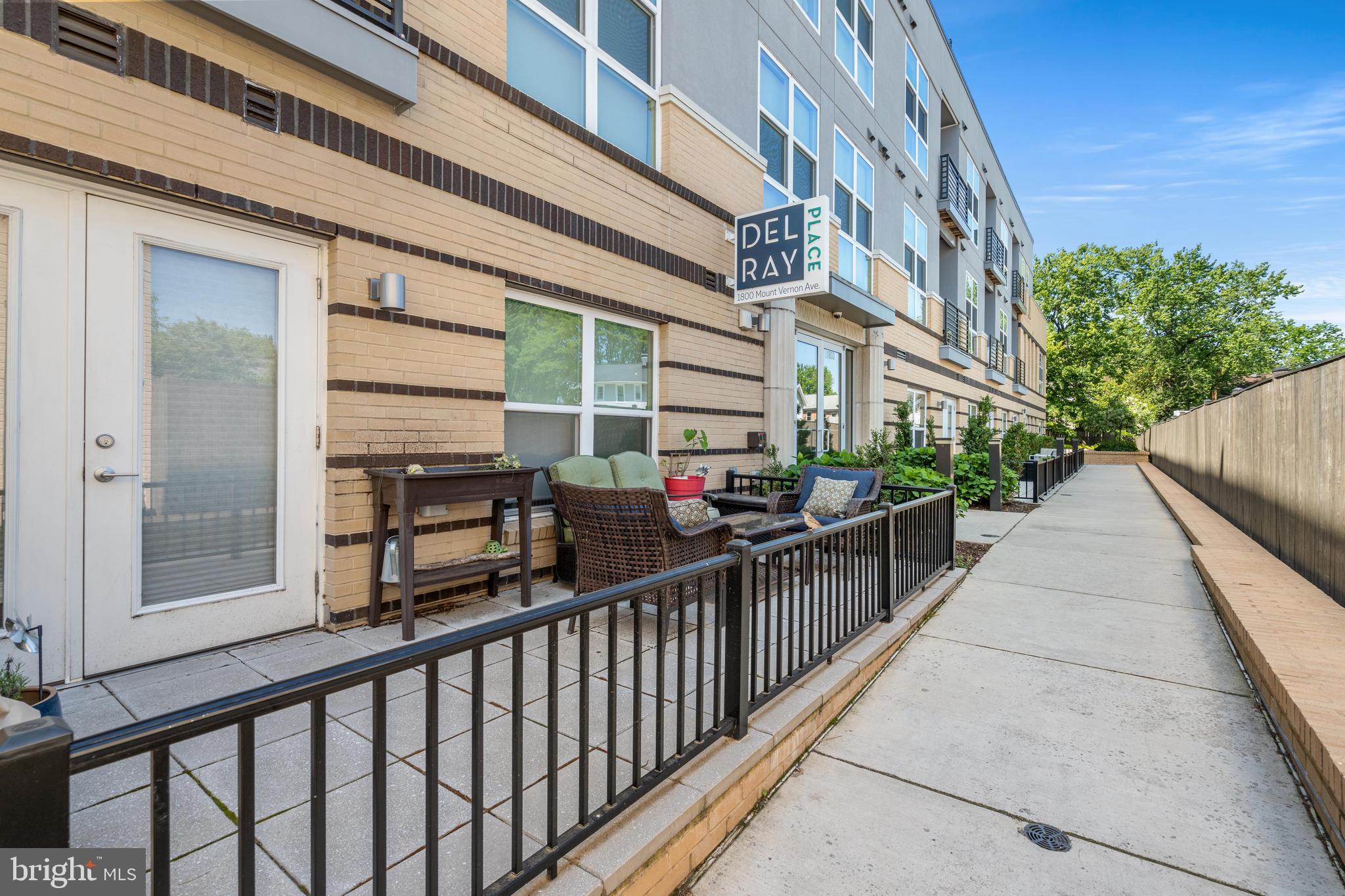 Welcome to this fantastic 1 bed, 1 bathroom 611 sqft condo in Del Ray Place Condominiums in Del Ray, Alexandria. Everything is new (Built in 2019) and ready for you to move right in! The open concept living/dining/kitchen space is large and bright with floor to ceiling windows and 9’ ceilings. The kitchen is gorgeous with grey cabinets, quartz counters, stainless steel appliances, and gas cooking. The unit comes with a private patio extending the entire length of the unit, perfect for entertaining. The spacious bedroom features a closet with custom shelving and the bathroom has a large soaking tub/shower combo. There are full-size in-unit laundry units in the main hallway of the unit.

This condo also includes assigned underground garage parking (space #4). The amenities of the building include an upscale clubroom with large wet bar and TV (1st floor) and two separate outdoor terraces for entertaining large groups (4th floor). The patio is one of the largest in the community, measuring 18 ft by 7 ft. It also has common ground at the back of the building with a grill and fire pit. Bike racks located in the garage.

If you are looking for a perfect location, welcome to Del Ray. Take a short stroll and grab your morning coffee at St Elmo’s, head to a CrossFit class at CrossFit MVA and bring your dog to Simpson Dog park. Get your fresh veggies at the Del Ray Farmers Market on Saturdays or some delicious southern comfort food from Stomping Ground. Stop by The George for vintage shopping. In addition to everything Del Ray, the condo is great for commuting and is close to the Braddock Metro ( 1 mile away). You can quickly be in Old Town, Potomac Yard, Amazon HQ2, National Landing, and DC. Walk across the street to the 10A bus stop which has a direct line to the Pentagon.

Tenant pays: Electric, gas, internet, and cable.
Landlord pays: Condo fee, water, sewer, trash.
Pet policy: Cats and dogs (no size, breed restrictions) are ok, 2 max. $500 non-refundable pet fee.
Please note, while the unit is available for immediate occupancy, there is a move-in process to comply with that  includes 7 days notice in writing. This move in policy is non-negotiable with the condo management company.