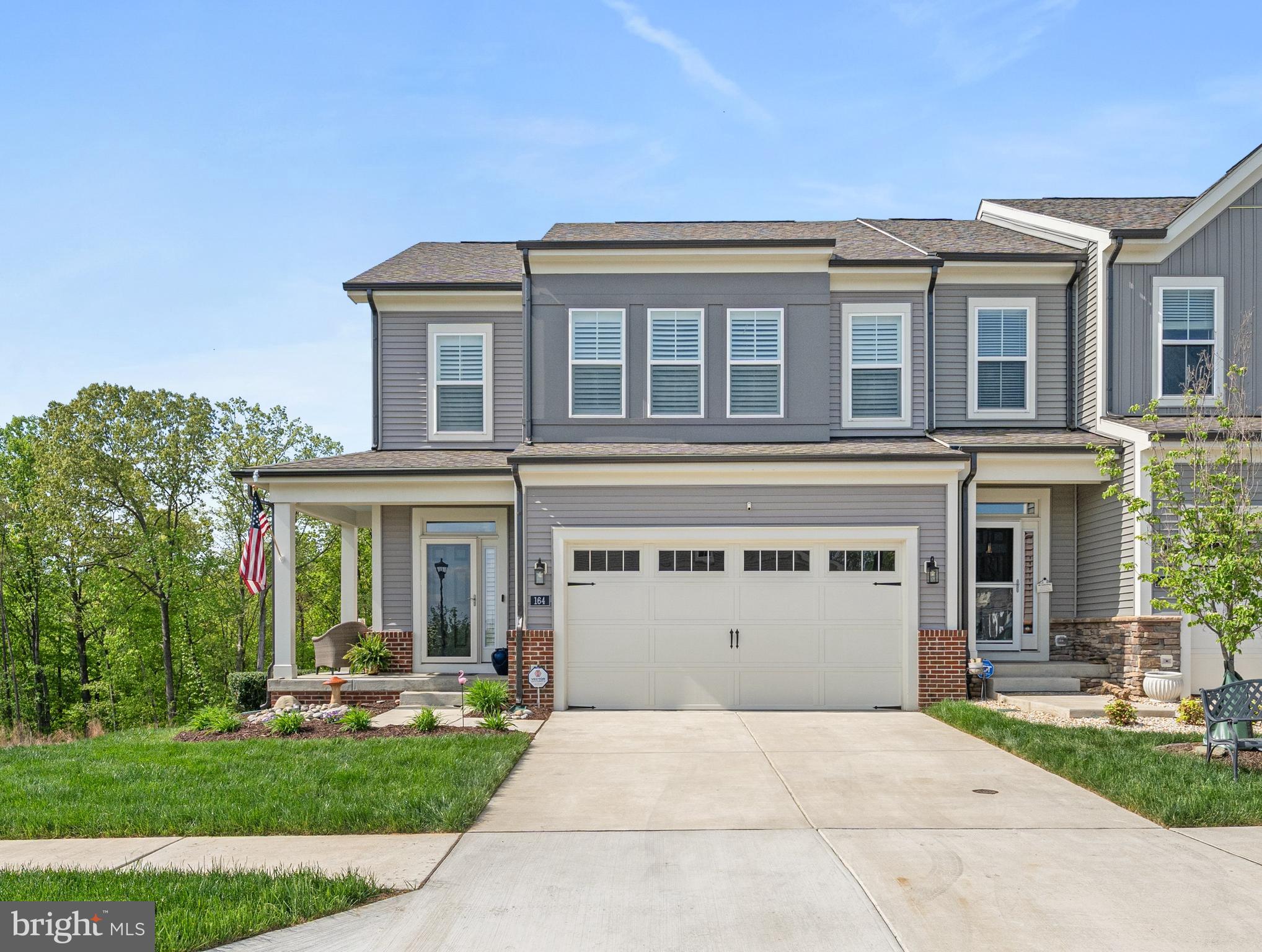 Located in the 55+ Cascades of Embrey Mill, This home offers an exceptional blend of high-end custom finishes and the benefits of an active adult lifestyle.  Experience luxury living in this stunning end-unit townhouse, perfectly situated on a premier private lot.  Over 3,300 finished sf on three levels.  The open-concept living area features a soaring vaulted ceiling, a cozy stone fireplace and elegant plantation shutters.  The gourmet kitchen is designed for a chef’s delight.  The main-level primary ensuite provides a private retreat and boasts a zero-entry, walk-in shower.  The second floor includes two nice-sized bedrooms complemented by a versatile, open loft area and full bathroom.  A fourth bedroom and yet another full bathroom are found on the lower level.  This walk-out  level provides significant recreation space both inside and out.   The rec room offers ample space for family entertainment.  Outdoors the large stamped concrete patio was designed with a built-in sunshade umbrella.  Enjoy the serene, wooded backdrop from the patio as well as the deck and screened-in area above.  Plenty of birds and wildlife can be found right in your backyard.  Close by is the Cascades Community Center designed for active adults.  Pickleball & bocce ball courts, game room, yoga & weight rooms, fire pit, etc. can be found here.  The community is also part of the larger Embrey Mill Subdivision that is rife with dining, shopping and entertainment options along with ten miles of trails.