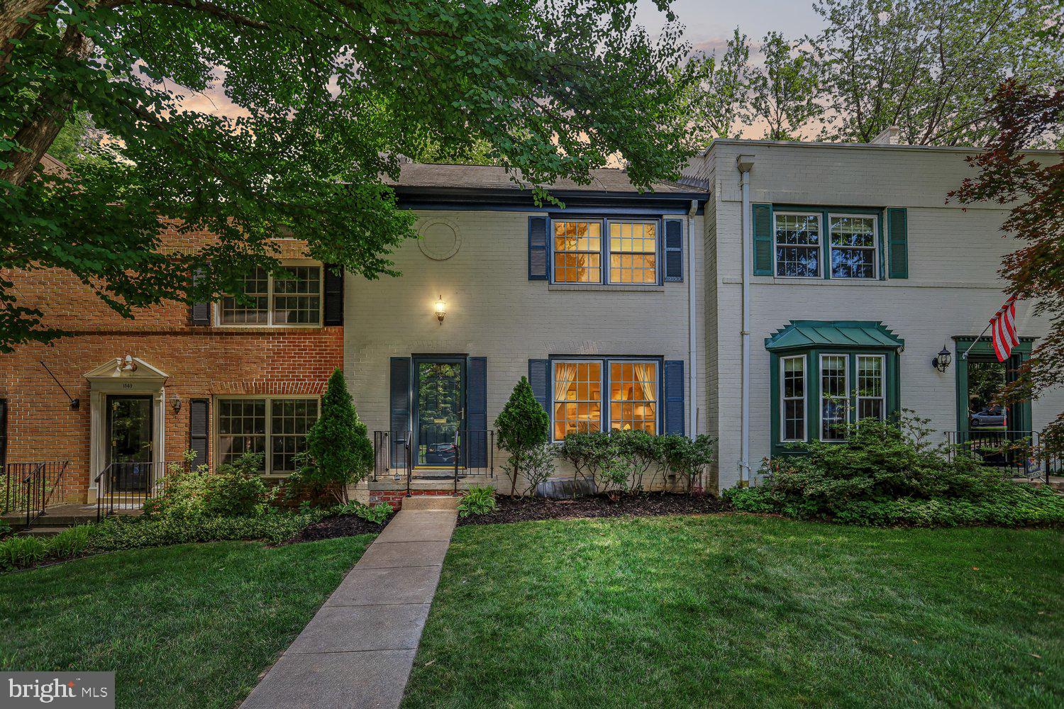 Nestled within the coveted enclave of Governour’s Square, this beautifully reimagined townhome presents a rare opportunity to experience refined living in one of Reston’s most desirable neighborhoods. A graceful curved staircase creates a striking first impression, setting the tone for the home’s sophisticated interiors and thoughtful updates throughout.

Designed for both everyday living and effortless entertaining, the sun-filled main level features an open-concept kitchen appointed with gleaming granite countertops, a breakfast bar, and stainless steel appliances. French doors from the dining area open to a private balcony, creating a seamless connection between indoor and outdoor spaces. Rich hardwood flooring extends throughout the upper levels, while tastefully renovated bathrooms showcase a clean, contemporary aesthetic.

The walkout lower level offers a versatile retreat, complete with custom built-ins, new luxury vinyl plank flooring, and French doors leading to a fenced-in, paved patio enveloped by mature trees. An additional private entrance enhances both flexibility and convenience. Recent improvements include a new furnace and air-conditioning system installed in 2026, while bespoke lighting fixtures lend warmth and character throughout the home.

Beyond the residence, an exceptional lifestyle awaits. Just moments from the picturesque waterfront of Lake Anne Plaza, residents enjoy immediate access to the renowned Saturday Farmers Market, charming cafés, locally owned restaurants, the Reston Museum, and community gathering spaces. Minutes from Reston Town Center, with its vibrant collection of boutiques, acclaimed dining destinations, concerts, festivals, and events.   Just a few blocks from both the Wiehle Ave.& the Reston Town Center Silver Line Metro and minutes to Dulles International Airport.  This is more than a home—it is an opportunity to become part of one of Northern Virginia’s most thoughtfully designed and enduringly sought-after communities.