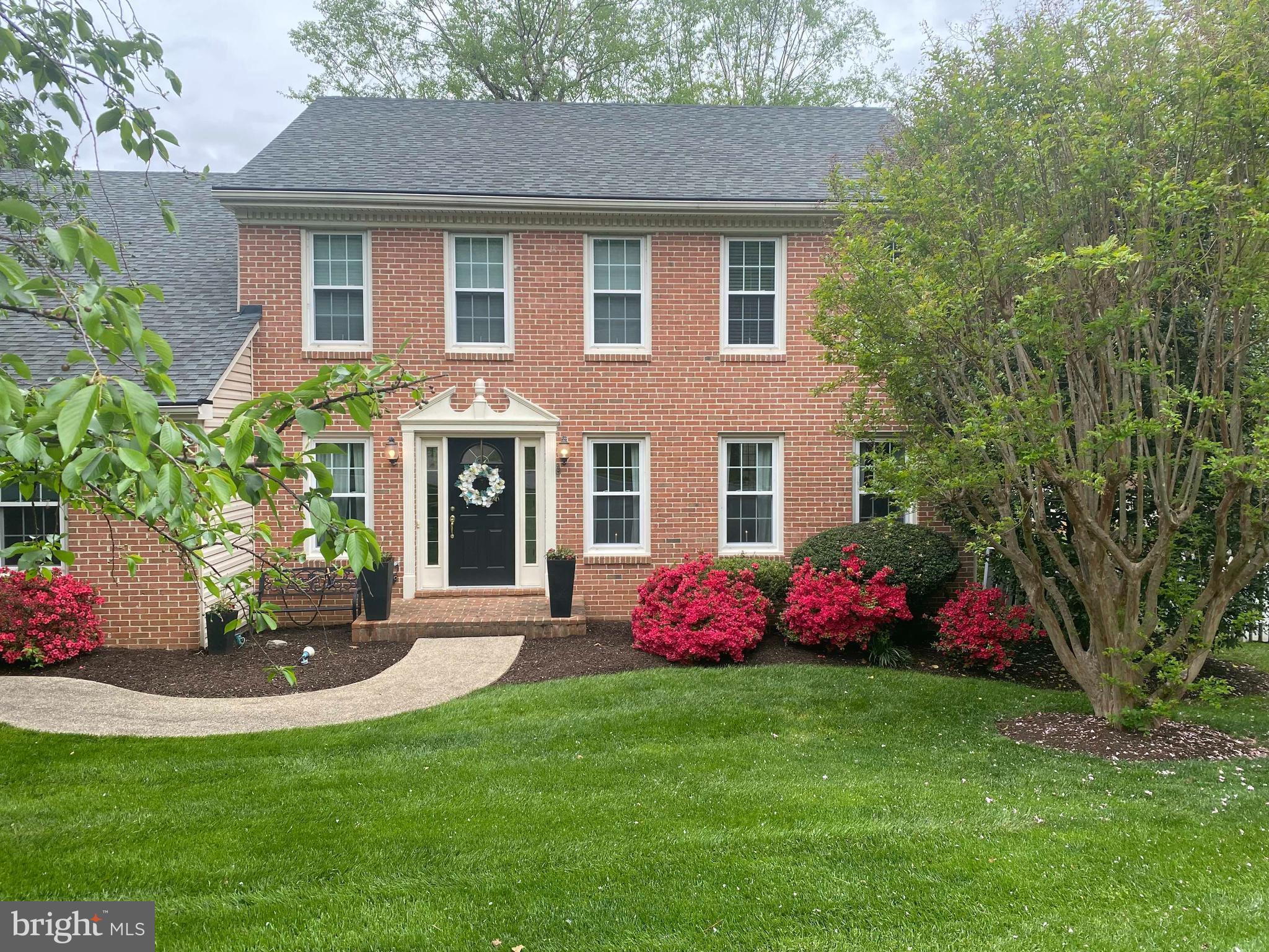 Located on a quiet cul-de-sac, this wonderful 4 bedroom colonial is perfectly situated on a prime lot in the Town of Herndon.  Offering over 4,000 square feet of living space, this spacious home has a great flow with an open floor plan and large, light filled rooms.  It's built for tranquil living and effortless entertaining, and offers multiple spaces for work and play! 

Enjoy the manicured front lawn as you approach the stately brick front entrance.  Enter into the spacious formal living room and dining rooms.  An updated table-space kitchen includes granite counters, stainless steel appliances, updated lighting, a large pantry and an island with additional cabinet storage.

The recent sunroom addition is absolutely stunning and features a vaulted shiplap ceiling, heated floor, a tropical palm ceiling fan, full window surround, and access to the side deck by glass doors on either side.  Step out of the sliding glass door to the inviting deck, complete with accent lighting and a ceiling fan. It's the ideal place to unwind after work, reflect on the day ahead with your morning coffee or take a mid-day zoom call.  The spacious family room is open to the kitchen and showcases an enchanting brick-faced gas fireplace flanked by two built in floor to ceiling shelving units. Hardwood flooring is found throughout the main level.

Upstairs you'll find 3 well sized bedrooms, a nicely updated hall bathroom, and a spacious primary suite.  The primary bedroom boasts two large walk in closets, a third closet featuring built in shoe racks, hardwood floors, a vaulted ceiling and a new ceiling fan.  Recently completed, the beautiful renovation of the primary bathroom reflects today's modern standards and includes a frameless glass shower surround with multi-head shower system, a double custom vanity, porcelain tile heated floor, updated lighting, separate water closet and more. 

The lower level features a huge recreation room, a full sized laundry room and a full bathroom. There's also a kitchenette that includes a refrigerator, sink and cabinets.  A separate bonus/guest room with a built in Murphy bed and the unfinished storage area complete the lower level.

Outside, you'll be thrilled with all the outdoor entertainment options. There’s a side deck that's perfect for having a few neighbors stop by.  On the other side, the deck leads to a 6-person hot tub, perfect for enjoying chilly fall nights. Beyond that you'll see the gorgeous outdoor patio that’s large enough to hold 30 people.  The circular patio features a partial retaining wall and a built in grill station and island.  The large backyard is fully fenced and well manicured with beautiful mature plantings creating a magical setting for your outdoor gatherings.

Fantastic location right in the heart of Herndon. Enjoy Herndon's Farmer's Market, Friday Night Live summer concerts, Fourth of July celebrations and the annual Holiday Arts and Crafts Show.  Walking distance to Downtown Herndon shops, restaurants, parks and the W&OD.  Windows replaced, HVAC 2023, HWH 2017, upper level carpeting 2021, NO HOA!