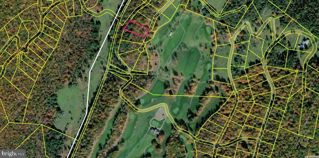 Discover the perfect blend of natural beauty and modern convenience with this 1.23-acre homesite in Fisher Mountain Estates Golf Club & Community. Enjoy a serene setting with recreational opportunities and golf right at your doorstep, surrounded by tranquil rural landscapes and scenic mountain views.  ------  Fiber optic service has been installed throughout the community, providing high-speed connectivity while maintaining a peaceful retreat atmosphere. Model homes are available in each section, and three homes are currently under construction on this street, highlighting the continued growth and desirability of the area.  ------  The HOA includes exclusive membership to the golf club, featuring unlimited tee times on the 18-hole championship course, along with a Toptracer driving range, clubhouse, restaurant, pro shop, and bar. Take in breathtaking views of the Potomac Highlands, including a signature island green and a picturesque 5-acre lake.  ------  Conveniently located within walking distance or a short golf cart ride to the clubhouse and amenities, this property offers an exceptional opportunity to build now or invest in a thriving community while still enjoying the calm of mountain living.