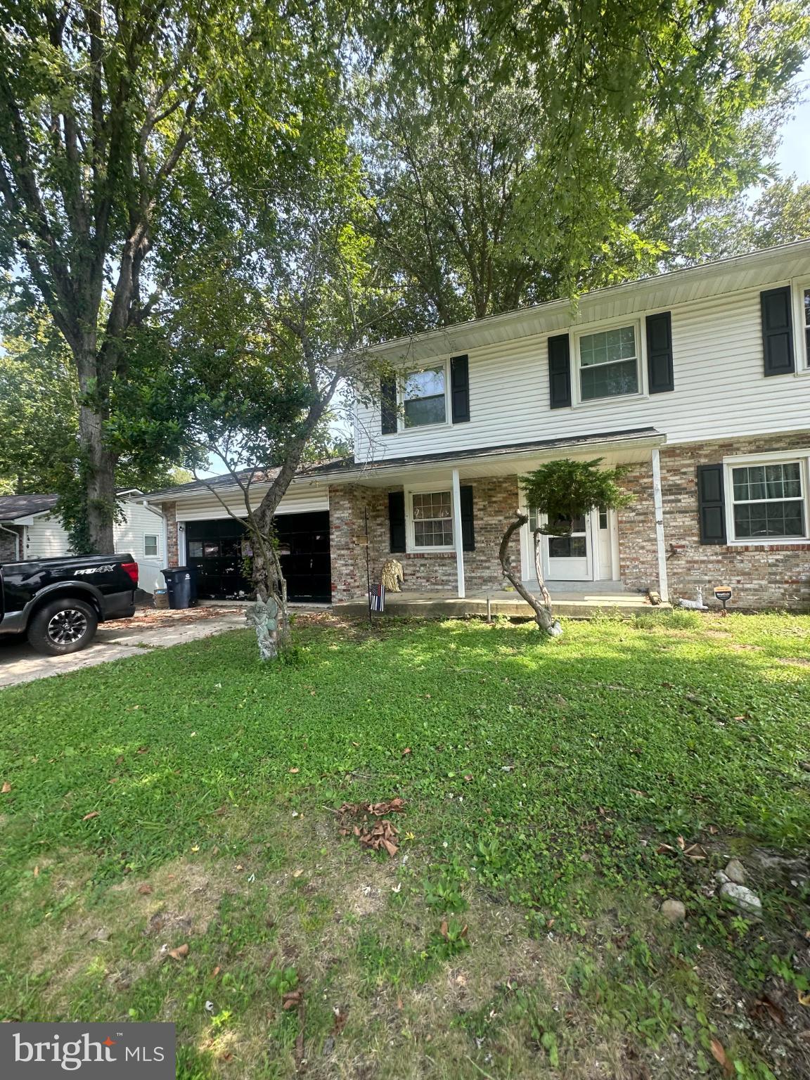 Situated in the desirable Forest Knolls community, this spacious 4-bedroom, 2.5-bath home blends strong fundamentals with room for personalization. Updates are needed but the big items have already been done for you! Updates include a newer roof, windows, HVAC, and water heater, giving you a great head start on renovations. Hardwood floors under carpet. The two-car garage adds everyday convenience, while the location offers easy access to D.C., Arlington, and major commuter routes. A wonderful opportunity to create your dream home in an established neighborhood!