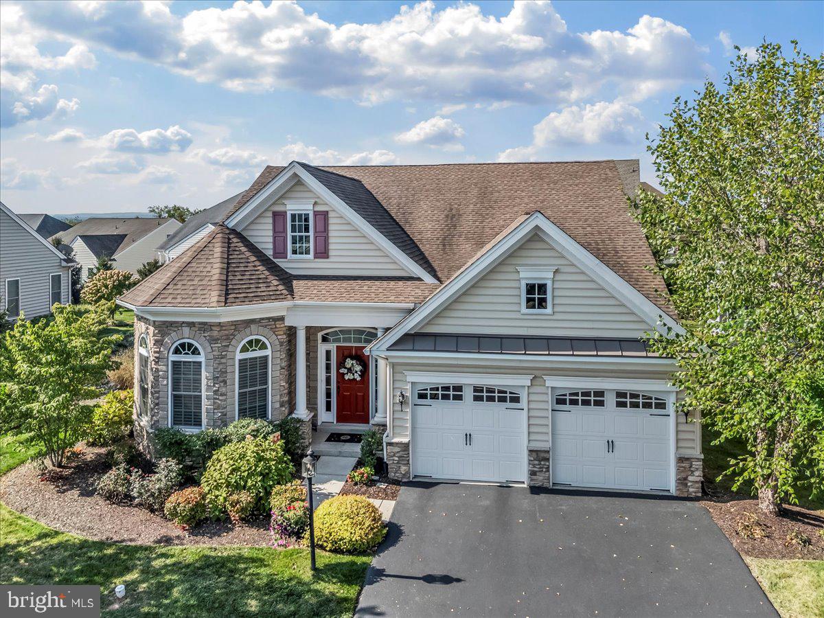 Luxury, Privacy & Flexible Living in “Meadow Glen at Skippack”  Located in the highly sought-after community of “Meadow Glen at Skippack”, this desirable home is situated on a premium lot with a dedicated buffer. The outdoor setting is peaceful and private, featuring a screened-in porch and an expansive custom-designed paver patio surrounded by plantings. Whether entertaining or enjoying quiet morning coffee time, this outdoor retreat is designed to be enjoyed year-round. Relax, Reflect, Entertain, Enjoy! Inside, the well planned adaptable open concept floor plan features both the Primary Suite and a second bedroom on the main level. The interior of the home is enhanced by 10 ft ceilings, hardwood flooring, recessed lighting, upgraded tile, elegant moldings, and abundant natural light from numerous additional windows. A dramatic two-story private foyer welcomes you with a Williamsburg oak staircase and opens to a versatile room featuring three stunning arched windows, a tray ceiling, and additional extensive custom trim work. Ideal as a sitting room, home office, library, music room, or study, this flexible space adapts easily to your lifestyle. The spacious dining room is perfect for hosting family and friends and showcases a large double window and additional custom millwork. Gourmet Island Kitchen is designed for both everyday living and effortless entertaining featuring upgraded cabinetry with pull-out drawers, an extended stone countertop with seating, tile backsplash, tile flooring, gas cooktop, built-in oven and microwave, upgraded stainless steel appliances, double sinks, pantry, and transom window. The kitchen flows seamlessly into the sunny breakfast area and impressive Great Room. The Great Rm with soaring cathedral ceiling, ceiling fan, and three walls of expansive windows creates a bright, airy, and inviting atmosphere. Luxurious Primary Suite offers a tray ceiling and a spacious en-suite bath with a comfort-height double vanity, abundant storage drawers, separate shower, and private water closet. The remarkable walk-in closet provides exceptional storage and can easily accommodate an extensive wardrobe. Additional oversized closets are found throughout the home. The second main level BR offers flexibility as a guest room, office, craft room, or den and is conveniently located near a full hall bath. The laundry/mud room, complete with laundry tub, provides direct access to the two-car garage. Upstairs, the multi-purpose loft is additional living space that can be enjoyed in numerous ways - ideal for recreation, hobbies, media space, or a private retreat. An adjoining BR and full bath provide comfortable room for guests or family members.  The upper level also includes a large walk-in closet and a full-height 20' x 10' walkin storage room with window, offering outstanding storage space seldom found in 55+ communities. Beautifully maintained, bright, and welcoming, it's time to enjoy an easy and comfortable lifestyle in this notable home in a quiet and peaceful setting with low maintenance and the perfect size flexible floor plan!  Leave the snow shovel, snow blower, rake, and lawn mower behind. Community services include snow removal from roads, driveways, walkways, and front porches, along with spring and fall cleanup, leaf removal, tree and shrub trimming, and mulching. Spectacular Community Center features: Heated saltwater pool with whirlpool spa, Fully equipped fitness center, Entertainment room with catering kitchen and dance floor, Card room and library, Bocce court, Dog park, Walking trails, Elevator access and multiple gathering spaces Enjoy nearby golf courses and an outstanding location just minutes from charming Skippack Village, with 19 restaurants, wine tasting, shopping, and spa services. Providence Town Center, Wegmans, and numerous retail destinations are only minutes away, with convenient access to the PA TPK NE Extension. Experience resort-style living at its finest at Meadow Glen.