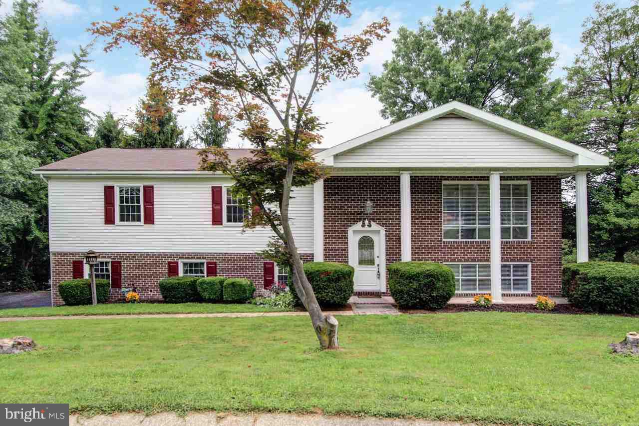 This updated 4BR/2.5BA has been freshly painted & is move in ready! Featuring HDWD flr's throughout on main level, formal LR open to separate DR w/wainscoting & crown molding, kitchen w/granite counters, tile backsplash & all appli's inc. The finished LL includes FR w/gas fp, 4th BR, office & powder rm. Enjoy the extending living space on the 2 level deck!