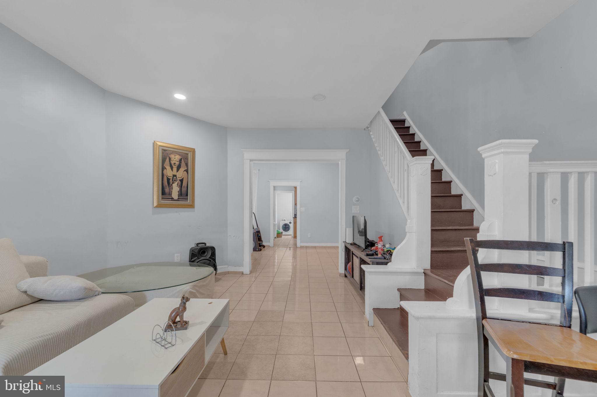 Discover this charming 3-bedroom, 2.5-bathroom townhouse situated in the heart of Feltonville. Built in 1940, this traditional masonry home combines classic architecture with modern living. Spanning 1,739 square feet, the fully finished basement offers versatile space for a home office, playroom, or additional bedroom (current use). Also includes a kitchenette. The main level features a spacious layout, with bright tiles, keeping the room cool and perfect for gatherings and everyday living. The well-appointed kitchen flows seamlessly into the dining and living areas, creating an inviting atmosphere. With ample natural light and thoughtful design, this home is ready for your personal touch. Enjoy the convenience of on-street parking and additional options nearby. This house has a sizeable front porch and also an indoor/ enclosed porch. Perfect for relaxation, or play, making it a great retreat after a busy day. Located in a vibrant community, this property is close to local amenities, ensuring that shopping, dining, and recreation are just moments away. Experience the charm of Feltonville while enjoying the comfort and space this home has to offer. Don't miss the opportunity to make this delightful townhouse your own!