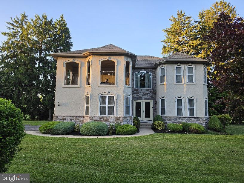 Custom made home by one of the main luxury builders of Huntingdon Valley made exceptional value for this beautiful home. For the experience of exceptional craftsmanship and luxury living in this phenomenal  home thoughtfully designed with elegance, comfort, and functionality throughout. This stunning 4-bedroom, 2.5-bath residence welcomes you with a dramatic two-story home, the foyer welcomes you with sweeping views with custom made expensive window treatments. Formal living and dining rooms - separate creating an impressive first impression from the moment you enter. The heart of the home is the spectacular gourmet kitchen featuring high-end upgraded appliances, plenty of 44" abundant cabinetry, and an open flow, perfect for both entertaining and everyday living. The gas stove top has a functional stainless steel hood above. The granite counter provides plenty of working space as well as seating and a separate breakfast area facing the sun.  The expansive family room, located directly off the kitchen eating area, showcases a gas fireplace, accented with beautiful lighting, completes this open floor concept layout, connecting all the main floor living spaces. So much space for entertaining, or for your daily lifestyle.  Rich hardwood flooring extends through much of the first floor, adding warmth and sophistication. Recess ceiling lights throughout the home. Upstairs, the beautiful hallway overlooking the two story family room, creates a luxury feel. The phenomenal primary suite serves as a true retreat with dual oversized walk-in closets featuring separate dressing areas, and a spa-inspired Jacuzzi, huge glass stall shower with double sink and granite counter top. There are beautiful large tiles on the floor and shower area.  All other bedrooms features its own large closet. These 3 remaining bedroom utilize the beautifully designed hallway bathroom.  Walk in closets and generously sized rooms make this home perfectly versatile for all your lifestyle needs. Convenient first floor spacious mudroom and laundry room. Full semi finished basement to make your own Office room/gym or a fifth bedroom.  Two car garage offering ample storage and functionality to enter the mud room.  Attention to detail and quality craftsmanship is incorporated into this home with exceptional timeless elegance and today’s modern lifestyle. 
 Second floor balcony for summer entertainment brings more value for this home. Custom made chandelier hanging from the second floor to the entrance brings more elegance to the home. This home also offers a dual air conditioning and heating system. 
This home is situated in the blue-ribbon Lower Moreland school district with walking distance to elementary school.  Close to public transportation, train station and shopping centers.