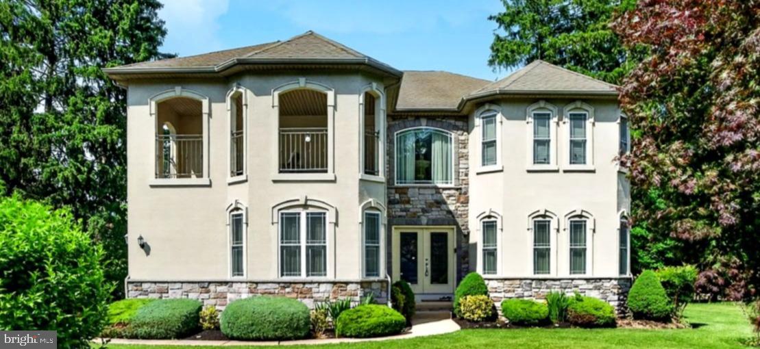 PRICE DROPPED FOR QUICK SALE. Reduced $50,000.
Experience exceptional craftsmanship and luxury living in this stunning custom-built home by one of Huntingdon Valley's premier luxury builders. Thoughtfully designed with elegance, comfort, and functionality in mind, this impressive 4-bedroom, 2.5-bath residence offers timeless appeal and modern convenience throughout.
A dramatic two-story foyer welcomes you into the home, showcasing sweeping views, custom window treatments, and elegant finishes that create a memorable first impression. Formal living and dining rooms provide ideal spaces for entertaining and special gatherings.
The heart of the home is the gourmet kitchen, featuring high-end appliances, abundant 44-inch cabinetry, granite countertops, a gas cooktop  and a bright breakfast area overlooking the backyard. The kitchen flows seamlessly into the expansive family room, where a gas fireplace and custom lighting create a warm and inviting atmosphere.
Adding to the home's versatility is a massive first-floor flex room, offering endless possibilities as a home office, playroom, media room, library, guest space, or additional living area to suit your lifestyle needs.

Rich hardwood flooring, recessed lighting, and quality finishes enhance much of the main level. Additional conveniences include a spacious mudroom, first-floor laundry room, and interior access to the attached two-car garage.

Upstairs, an elegant hallway overlooks the foyer below, adding to the home's open and luxurious feel. The impressive primary suite serves as a private retreat, featuring two oversized walk-in closets with separate dressing areas and a spa-inspired en-suite bath complete with a Jacuzzi tub, oversized glass-enclosed shower, dual vanities with granite countertops, and beautiful tilework throughout.

Three additional generously sized bedrooms each offer ample closet space and share a well-appointed hall bathroom. A second-floor balcony provides the perfect setting for outdoor relaxation and summer enjoyment.

The semi-finished basement offers endless possibilities, whether you envision a home office, fitness area, recreation room, or potential fifth bedroom. Additional highlights include a custom chandelier, DUAL ZONE heating and air conditioning systems, and exceptional attention to detail throughout.

Located within the award-winning Lower Moreland School District and within walking distance of the elementary school, this home also offers convenient access to public transportation, regional rail service, shopping, dining, and major commuter routes.