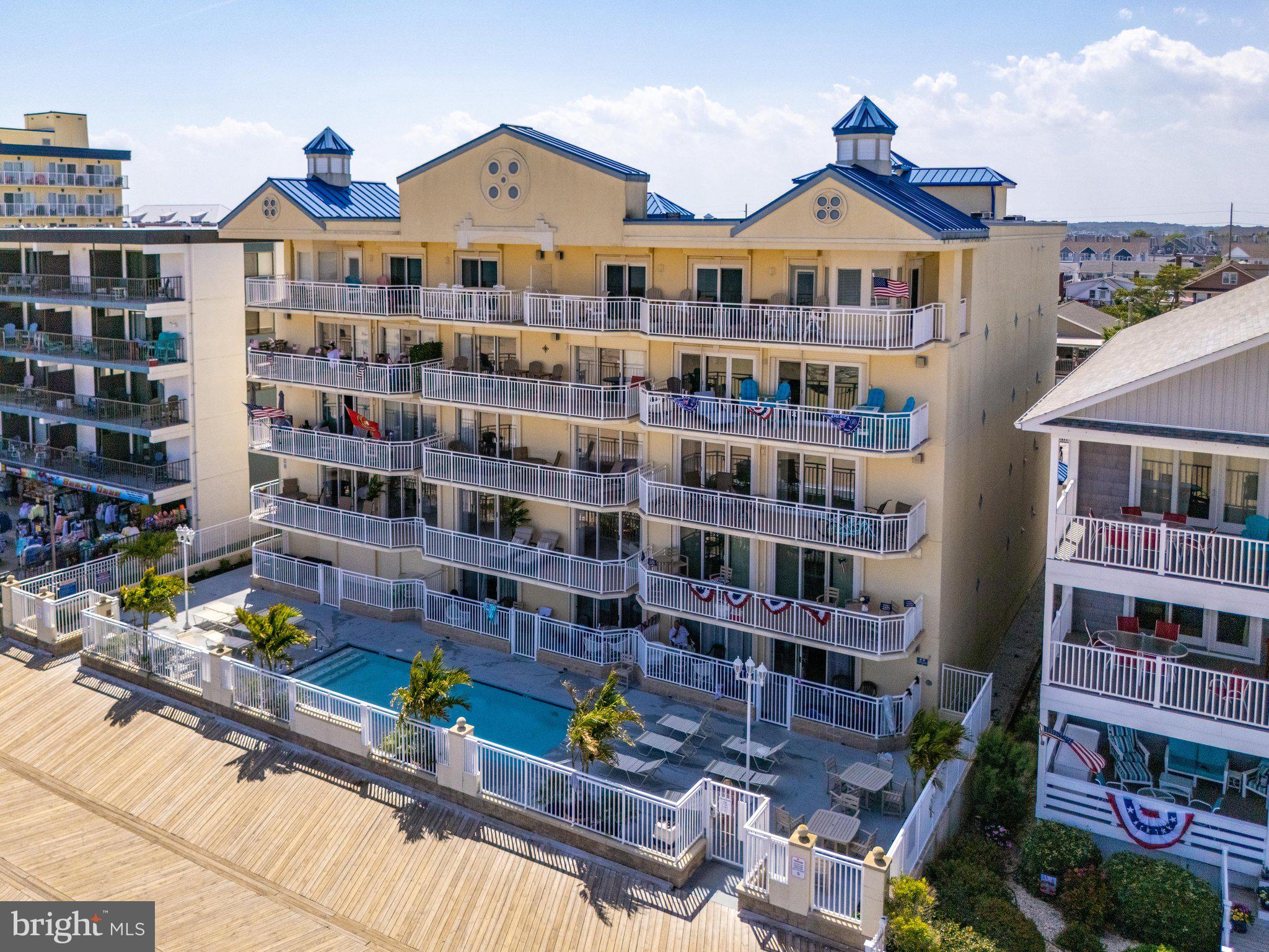Lovely 3 bedroom 2 bath residence in the premier beachfront condominium building  Oceans Pointe  located in the heart of downtown Ocean City, Maryland. Known for its prime location right on the boardwalk, the property is celebrated for offering panoramic ocean views and effortless beach access. This spacious unit features an open living room, dining, kitchen combination that is a wonderful space for everyone to gather.  Watch the happenings on the boardwalk and the oceanview while cooking dinner in the extra large  kitchen with bright white cabinetry and  counters  .  Plenty of room for the whole gang to gather.  There is a gas fireplace in the living room  to snuggle up to on those cool winter evenings while you gaze at the moon over the ocean .  The oceanfront balcony spans the entire length of the condo offering panoramic views of the beach and boardwalk. The primary bedroom is oceanfront  with access to the balcony.  The huge ensuite bath has a whirlpool tub a separate shower and  double sink vanity.  There are 2 other large bedrooms.  Plenty of sleeping space for friends and family.  Beautiful ceramic tile floors through out  Separate laundry room with storage and an attached utility closet that houses the hot water heater and hvac.   This unit is sold fully furnished, turn key.   This building has an amazing oceanfront pool,  elevator, handicap ramp,  private storage room, 2 assigned parking spaces and  bike rack.  Whether you are looking for your own oasis or a great investment this property is a winner.  Don't let this one get away.  Call to view today and start living your beach dream.