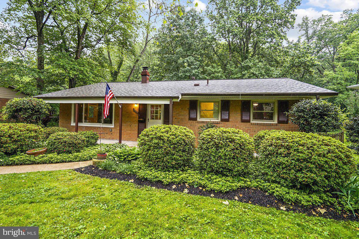 OPEN HOUSE SUNDAY 5/24 12-4 P.M.! Welcome home to 3903  IVYDALE DRIVE - a stylishly renovated brick home situated on large 1/3 acre lot in community-minded, quiet Sleepy Hollow Woods neighborhood! You will love the private and secluded backyard, backing to a protected 17 acre Fairfax County green-space! This home has it all with 4 Bedrooms + Den/Office, 3 full Bathrooms, Large Gourmet Kitchen & Huge Family Room! Thoughtfully designed open-concept main floor kitchen/dining room/living room boasting warm-toned solid oak floors, stacked stone peninsula gas fireplace with two solid cherry box mantles and solid slab limestone hearth! The kitchen has solid cherry semi-custom cabinets, stacked stone backsplash, expansive quartz countertops, gas cooktop with pot filler, double oven and large butcher block island. The dining room has built-in wine bar with granite top and ample wine storage! Freshly refinished hardwood floors throughout main level and new carpet in lower level featuring a recreation room, bedroom and office/den. Bright 300 sqft laundry room with closet, built in ironing station and ample storage completes the package! Newer A/C, Furnace, Windows, Doors & Roof & Electrical Panel! Beautifully crafted custom finished carpentry in common areas and most rooms. Recessed lighting & ceiling fans! Newer A/C, Furnace, Windows, Doors & Roof & Electrical Panel! Walking distance to 2 community pools and beautiful 148-acre Mason District Park (Farmers Market, playgrounds, walking/jogging trails, athletic fields, tennis and dog park). Ideal location - inside the beltway; close to 395, 495 and 66 with easy access to Mosaic District and Tysons Corner, 8 miles to the Pentagon, Amazon HQ2, and Washington, D.C. Nearby Fairfax County Schools include new Mason Crest Elementary and Congressional Private School! Hurry this one won't last! Contact listing agent Valerie Gaskins for appointment.