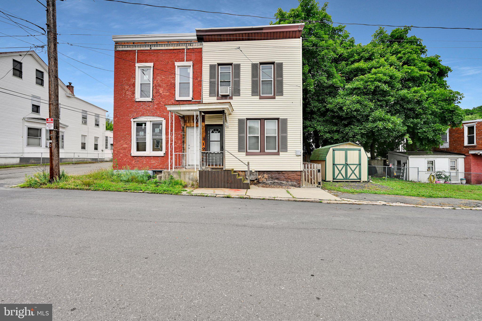 Ready-to-occupy semi in Pottsville remodeled throughout. The main level features a living room/dining room combo and a spacious kitchen with all appliances included, access to a covered side deck, and a small fenced-in area in the backyard. The upper level offers 3 bedrooms and a full bathroom. A partial basement with a washer/dryer. oil, water, heat, 100-amp service, natural gas available, and electric window air conditioners included. This home is being sold in as-is condition; all appliances remain.