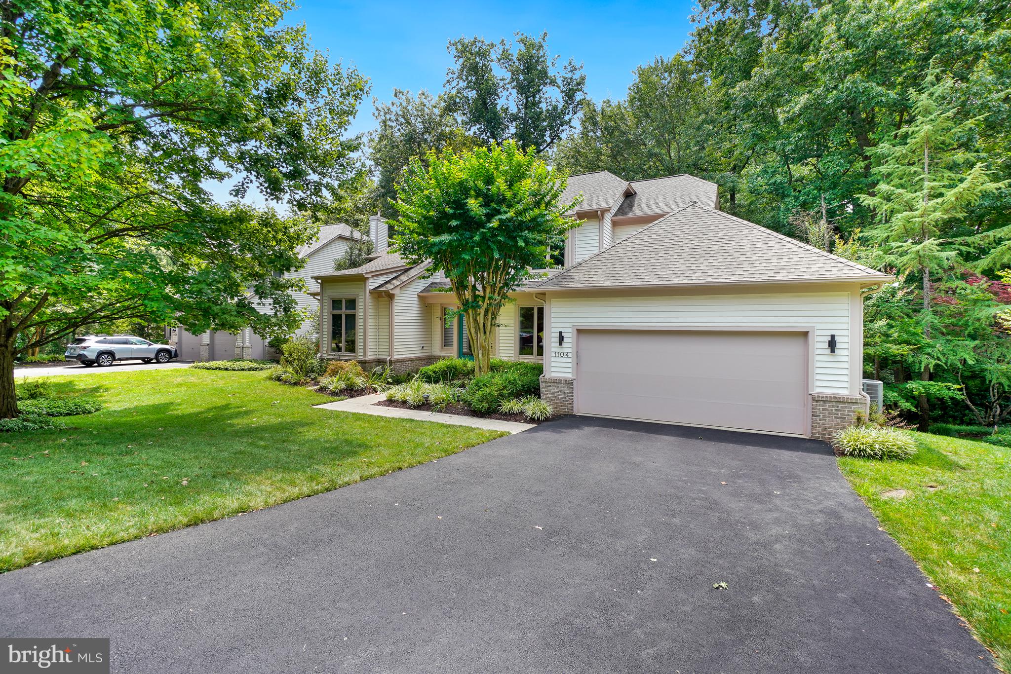 Nestled on a quiet cul-de-sac in the highly sought-after Water Pointe community of North Reston, this exceptional Gulick-built residence offers the perfect blend of elegance, comfort, and privacy. Situated on a beautifully landscaped 0.30-acre lot surrounded by mature trees, this home provides a peaceful retreat while remaining just minutes from Reston's premier amenities.
Designed for both everyday living and entertaining, the home features approximately 3,500 square feet of thoughtfully designed living space with 4 bedrooms, 3½ bathrooms, soaring ceilings, expansive windows, and abundant natural light throughout. The highly desirable main-level primary suite serves as a private sanctuary with a spacious luxury bath and generous closet space.
The gourmet kitchen opens seamlessly to inviting living and dining areas, while the dramatic family room showcases a fireplace and walls of windows overlooking the private backyard. The finished walk-out lower level provides flexible space for recreation, guests, or a home office and opens directly to the outdoor living areas.
Outdoor amenities make this home truly special. A spacious deck overlooks the beautifully landscaped yard and private in-ground pool, creating an ideal setting for summer gatherings or quiet evenings surrounded by nature. The home's premier location within the neighborhood offers both tranquility and convenience.
Residents enjoy easy access to Reston's extensive trail network, Lake Newport, North Point Village Center, Reston Town Center, Metro Silver Line stations, major commuter routes, shopping, dining, and top Fairfax County amenities. 
Updates include:  Heat Pump 2026, Furnace/AC 2025, Roof 2021, Water Heater 2023, Bosch Refrigerator 2022, Pool Pump 2025, Pool Heater 2024, Living Room Windows 2024, Motorized, remote controlled shades on lower level 2024, Lighting in basement and living room dimmable and remote control 2021.