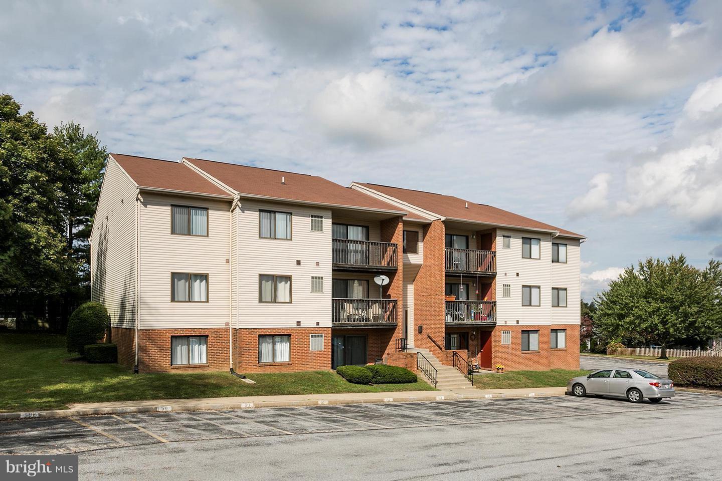 Fantastic opportunity to own this rarely available 3-bedroom, 1-bath, third-floor condo at an exceptional value! Offering a great opportunity to add your own personal touches, this home features an updated stainless steel refrigerator (2025) and a newer heat pump with central air, just 2 years old. Step outside to your private 12' x 5' balcony overlooking a peaceful, tree-lined view—the perfect spot to enjoy your morning coffee or unwind at the end of the day. Conveniently located in a charming, compact community just minutes from Route 30 and the bypass to I-795, this home offers easy access to shopping, restaurants, and everyday conveniences—all within walking distance. The low monthly condo fee includes water, sewer, exterior lawn maintenance, and common area upkeep, making for easy, low-maintenance living. Enjoy more free time while taking advantage of this convenient location and all it has to offer. Whether you're a first-time buyer, downsizing, or looking for an affordable home with room to make it your own, this condo is full of potential. Don't miss this opportunity—schedule your showing today!