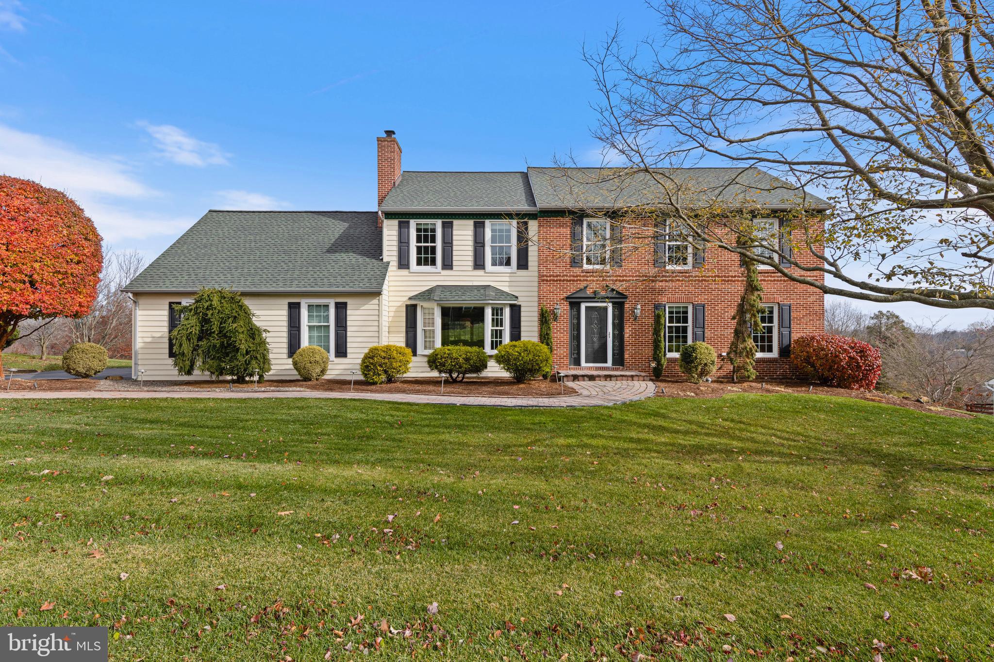 Welcome to one of the most distinguished homes in Bow Tree, East Goshen Township. Situated on a pristine and private 0.88-acre homesite, this exceptional 4-bedroom, 2.5-bath residence offers 4,165 square feet of meticulously designed living space. This home is ready for your elevated everyday living and effortless entertaining. The first floor features a spacious family room anchored by a striking stone fireplace, custom built-ins, a charming bay window, and stunning hardwood floors. At the heart of the home, the kitchen is nothing short of spectacular. A 13-foot breakfast bar and thoughtful layout complement every premium upgrade imaginable, including Italian tile flooring, pendant lighting, solid wood cabinetry, under-cabinet lighting, Corian countertops and backsplash, a Dacor oven, Sub-Zero refrigerator, built-in desk area, Dacor gas range with hood, and beautifully illuminated cabinetry that showcases every detail.  French doors lead to the formal dining room, perfectly appointed for memorable gatherings with crown molding, chair rail, and lighted built-in cabinetry. Also off the kitchen is the breathtaking great room, surrounded by windows and skylights, offers panoramic views of the lush back lawn, while sliding doors open to the deck. The side-entry addition effortlessly meets today’s lifestyle needs. The mudroom with custom lockers is both stylish and functional, and the oversized laundry room with a full closet was thoughtfully planned for maximum convenience. The powder room and direct deck access earn a 10/10 for practicality and flow. The wet bar is ideally located on the first floor, making entertaining a breeze with new ice maker. The second floor is equally impressive. The primary suite offers exceptional space to unwind, natural light, and a generous custom walk-in closet. The ensuite bath features soothing natural tones, a dual vanity, a beautifully tiled shower with a bench, and a dedicated linen closet creating a true retreat within the home. Three additional spacious bedrooms each include California Closets, ceiling fans, fresh paint, and brand-new carpet. The expanded hall bath provides built-in linen cabinetry for added convenience. The walkout finished basement is a true standout, offering an additional 950 square feet of versatile living space. A dedicated office with custom built-in desks and cabinets is ideal for work-from-home ease. The main recreation area is perfect for game nights, movie nights, or a combination of lounging and entertainment, with ample room for a pool or ping-pong table. From this level, step directly outside to the backyard for seamless indoor-outdoor enjoyment. There is also plenty of storage space on this level.  Exterior highlights include replacement Anderson Windows,new garage door, new driveway, flag pole, oversized two tiered deck,  and custom lighting that highlights the pristine landscaping. From the finest finishes to the smallest touches, this property embodies attentive care, creating a home that is truly extraordinary.