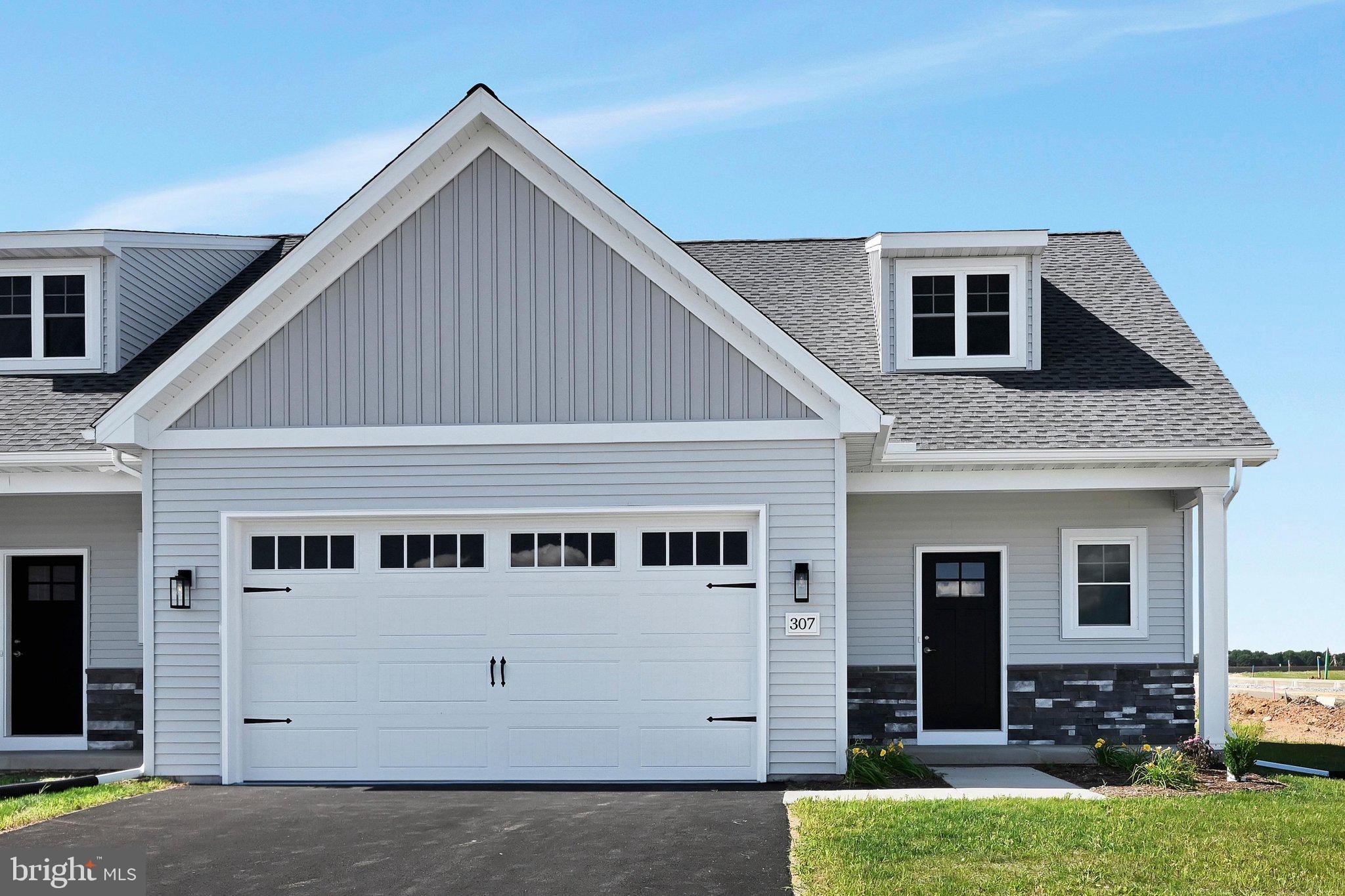New Phase of StoneyBrook Development in Elizabethtown! Discover easy, maintenance-free living in this exciting new phase of the StoneyBrook community, featuring 44 beautifully designed duplex homes. The Bakersfield floor plan offers a first-floor primary suite complete with a walk-in closet, a luxurious en-suite bath featuring a 5-foot tile-surround walk-in shower, and a double bowl vanity. The open-concept main level includes a spacious kitchen with 42-inch cabinets, a large 5-foot island, and a pantry, flowing seamlessly into the dining area and family room—perfect for entertaining. Additional conveniences include a first-floor laundry room and a half bath. Upstairs, you’ll find two additional bedrooms, a full bath, and a versatile loft area. Enjoy scenic views from your rear patio or deck and take advantage of the neighborhood’s extensive paved walking trails. Snow removal and lawn care are handled by the HOA, allowing you to relax and enjoy your new home.  Property taxes will be calculated once home is assessed.