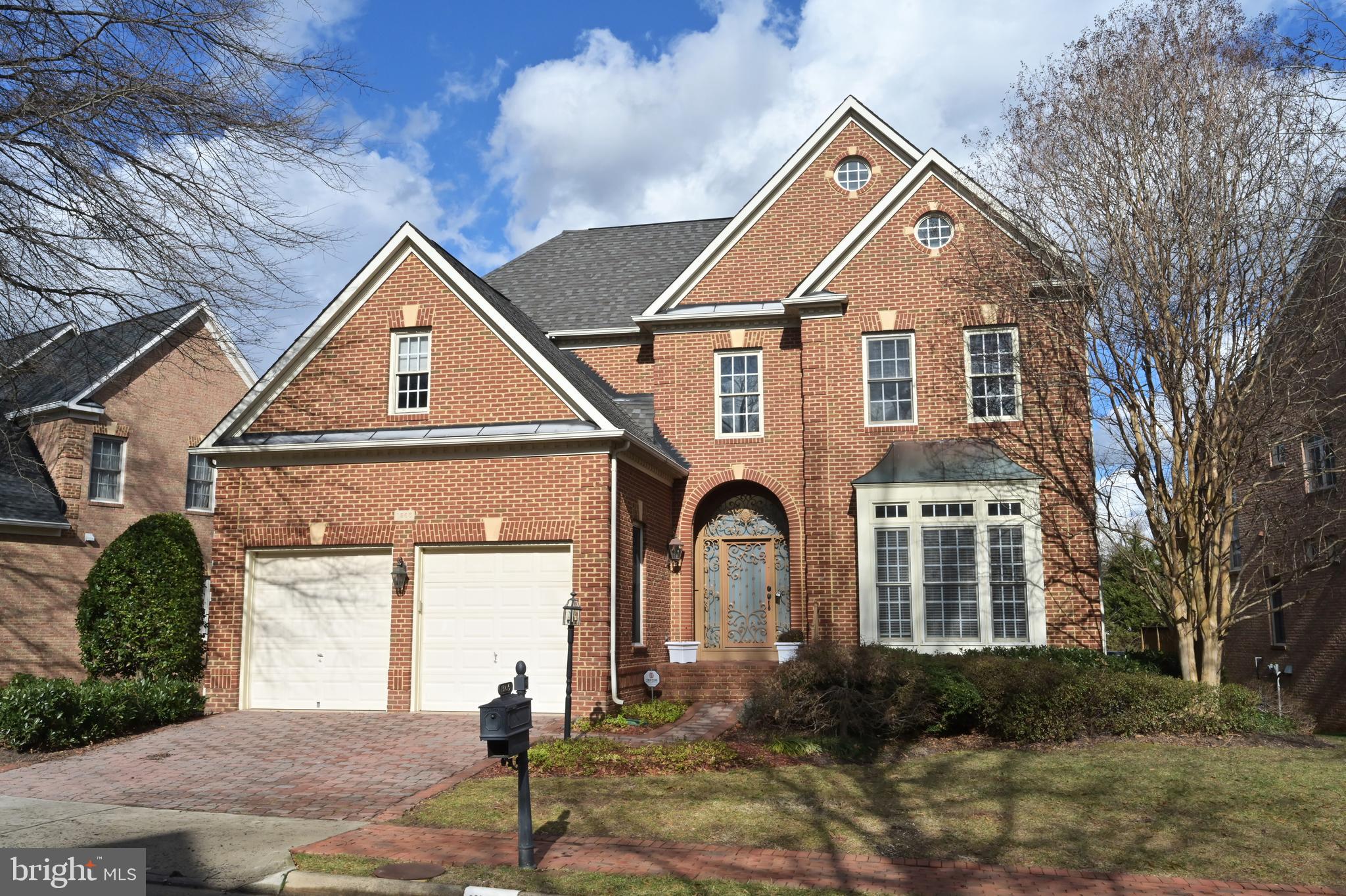 Constructed in 2001 by NV Homes, this distinguished all brick colonial graces a secluded cul-de-sac, overlooking protected common area and parkland, mere moments from Tysons. This residence epitomizes opulence, showcasing elevated finishes throughout. Traverse the brick driveway and walkway to the majestic iron and glass front door with sidelites and an arched transom window. The grand two-story entry hall features a split staircase adorned in stone and intricate iron rails. Marble flooring spans the entire main level, creating an atmosphere of sophistication.  To the right, the formal living room exudes elegance with heavy crown molding, a gas fireplace embellished with ornate iron surround, and a boxed bay window. To the left, an upgraded powder room, an office with built-ins, and a door leading to an enclosed private courtyard offer a seamless blend of functionality and refinement. The formal dining room boasts elaborate moldings, wainscoting, a tray ceiling, and a gas fireplace with ornate iron surround flanked by built-ins. The kitchen is a culinary masterpiece, featuring cherry cabinetry, granite countertops, stainless steel appliances, a walk-in pantry, and an oversized center island. An adjacent breakfast area provides access to the rear deck, offering commanding views of the common area. The family room is a testament to luxury with its coffered ceiling, crown molding, hardwood inlay border in the marble floors, and a stone fireplace.  Impeccable IPE Brazilian hardwoods grace the upper level, where the primary suite beckons with a tray ceiling and two walk-in closets, providing private access to the spa bath. The spa bath boasts oversized cherry split vanities, granite counters, a jetted soaking tub, and a spacious shower. Bedroom 2 Suite features a separate sitting room, walk-in closet, and ensuite bath. Bedrooms 3 & 4, both with walk-in closets, share a remodeled Buddy Bath adorned with beautiful marble stonework on floors, walls, and a frameless glass wall in the shower.  On the lower level, the walk-out recreation room and game room exude luxury with Maple hardwoods, crown molding, chair rail, and access to the rear patio. An exercise room, bedroom, full bath, and a storage room complete this level. Enjoy the convenience of walking to Spring Hill Recenter, McLean Hamlet Summer Pool & Tennis. Zoned for Langley High, Cooper Middle, and Spring Hill Elementary Schools, this residence embodies the epitome of refined living. Smoking is prohibited, and pets are considered on a case-by-case basis. A 12-month lease minimum is required. Tenants are responsible for all utilities, while the landlord will cover HOA dues. Repair deductible of $100 per event is the responsibility of the Tenant. Repairs over $100 require Landlord approval. For a rental application, further information, or a private showing, please contact the Listing Agent.