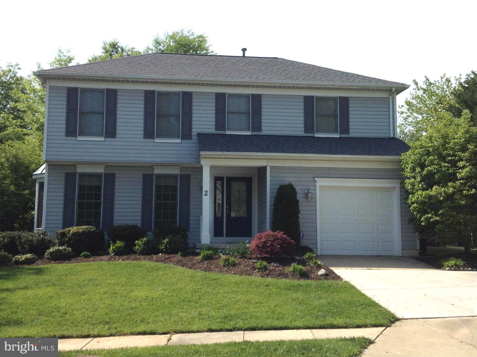 Beautiful sun-filled colonial with superb landscaping. Shows like a model home on HGTV. Pristine and impeccably maintained 4 bedroom, 2.5 Bath home boasts fabulous kitchen w/ stainless steel appliances and silestone countertops.  Enjoy your outdoor deck with a great flat yard. Perfect for entertaining!. Updated HVAC and new 50 year architectural shingle roof. Kitchen updated in 2015. Must see!!!!