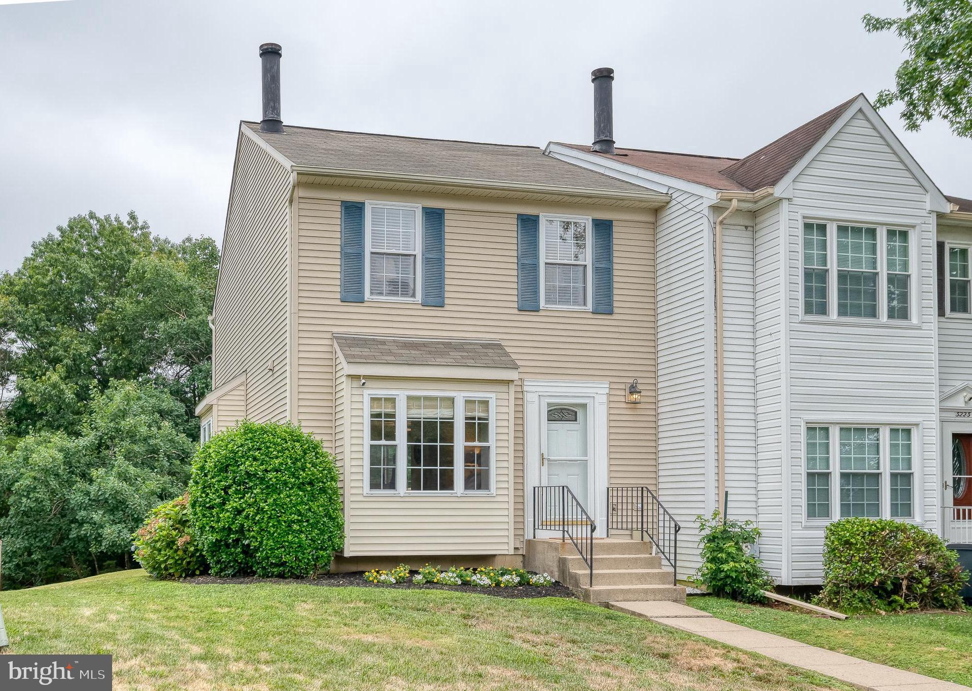 OPEN HOUSE SUNDAY FROM 12-2! Welcome home to this spacious end-of-group townhome featuring an open and functional floor plan designed for comfortable everyday living and entertaining. Offering 3 generously sized bedrooms, 2 full baths on the upper level and a convenient updated half bath on the main level, this home provides plenty of space for everyone. The bright living & dining rooms are enhanced by beautiful box bay windows that fill the home with natural light, durable laminate flooring & a cozy wood-burning fireplace that creates a warm and inviting gathering space. The well-appointed kitchen features granite countertops, a stylish backsplash, newer microwave & dishwasher and kitchen table space. Upstairs, you'll find brand-new carpeting and fresh paint throughout! Primary bedroom has private bath! The finished lower level offers a spacious rec room along with ample storage space/laundry area. Step outside to the large deck overlooking a generous backyard bordered by trees that provide a peaceful setting perfect for relaxing, grilling, or entertaining guests. This beautifully maintained home combines space, comfort, natural light and privacy in a desirable end-unit location—ready for its next owner to enjoy.  Close to major roadways, shopping, restaurants & parks!