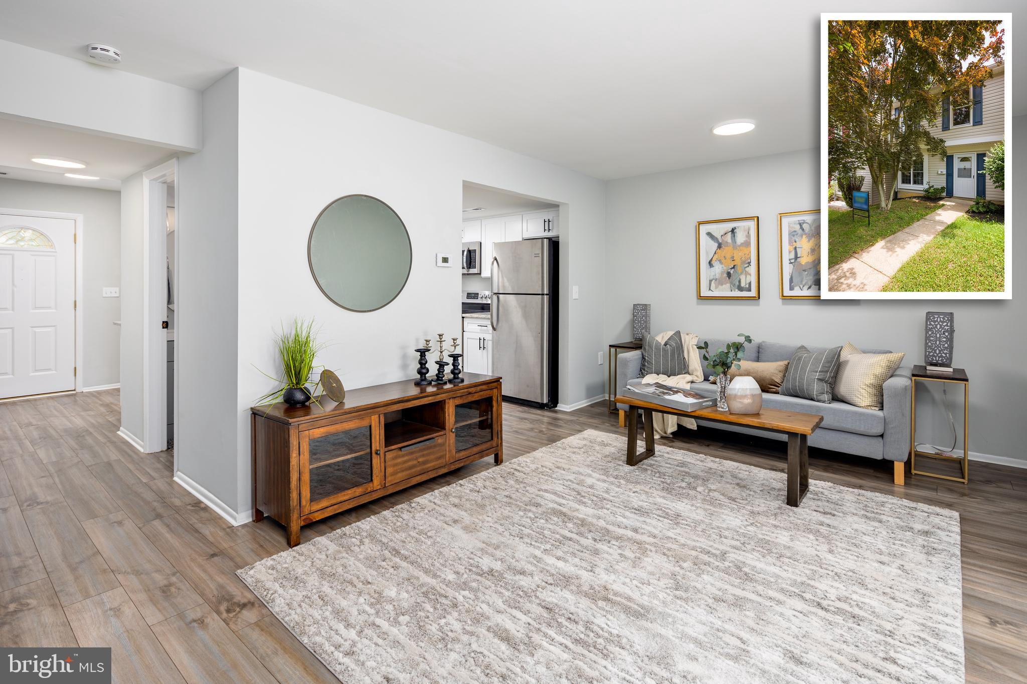 BEAUTIFULLY RENOVATED TOWNHOME IN THE WHISPERING WOODS COMMUNITY! Enter into your freshly painted townhome with brand new luxury vinyl plank flooring that seamlessly flows throughout the entire first floor. Enjoy a brand new kitchen with custom white shaker cabinetry, granite countertops and stainless steel appliances.   This home features a large family room with a conveniently located half bathroom and a wood burning fireplace that leads to a private large fenced-in yard. Upstairs features three spacious bedrooms and a remodeled full bathroom.  This home has so many updates and is ready for your to move right in.  House is vacant and easy to show so schedule your showing today!