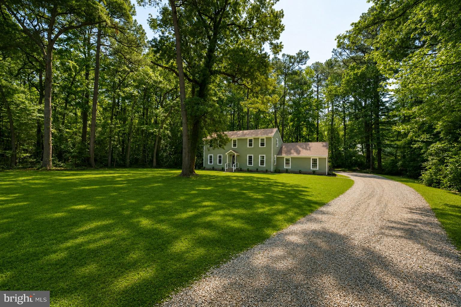 Beautifully renovated 3 bedroom, 2 bathroom Colonial-style home located in the highly sought-after Wildwood Trail neighborhood — a peaceful wooded no-through community. Situated on 1.19 acres, this 2,112 sq ft home offers plenty of space both inside and out.

The main level features a large open living room and kitchen area with new flooring throughout, fresh paint, and brand-new appliances. Off the connected kitchen & dining room, a large sliding glass door leads out to the new back deck, perfect for entertaining or enjoying the private backyard setting. The first floor a includes a spacious downstairs bedroom, full bathroom, and an additional flex room ideal for a home office, guest room, or extra living space.

Upstairs offers two generously sized bedrooms and another full bathroom. The attached 1-car garage includes a large finished bonus room, perfect for a home office, workout area, hobby room, or workshop.

A move-in ready property offering space, flexibility, and a desirable location!