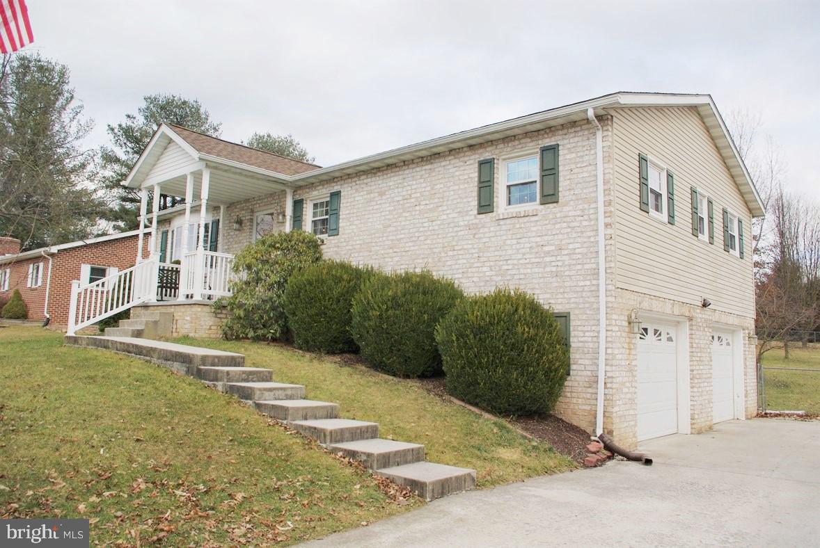 Conveniently located just minutes from Route 15 and Gettysburg or Hanover.  No HOA and low taxes make this an affordable option, and with recent updates and maintenance, you can't go wrong.  A new roof in 2013, new central air unit in 2017, new tankless hot water heater in 2018, new double hung, thermal-pane windows in 2006, updated storm doors, new pool liner in 2017 and new appliances in 2016. Spacious kitchen/dining area, 2 full baths, family room with propane stove, and huge 2 car garage. Propane forced air heat, with electric baseboard backup. You will enjoy entertaining in the big, fenced in back yard and on the covered deck overlooking the 15x24 pool.  An Elevation Certificate was completed to show that the house is not in the flood plan and will not be subjected to flood insurance.  Se documentation in BRIGHT Docs.