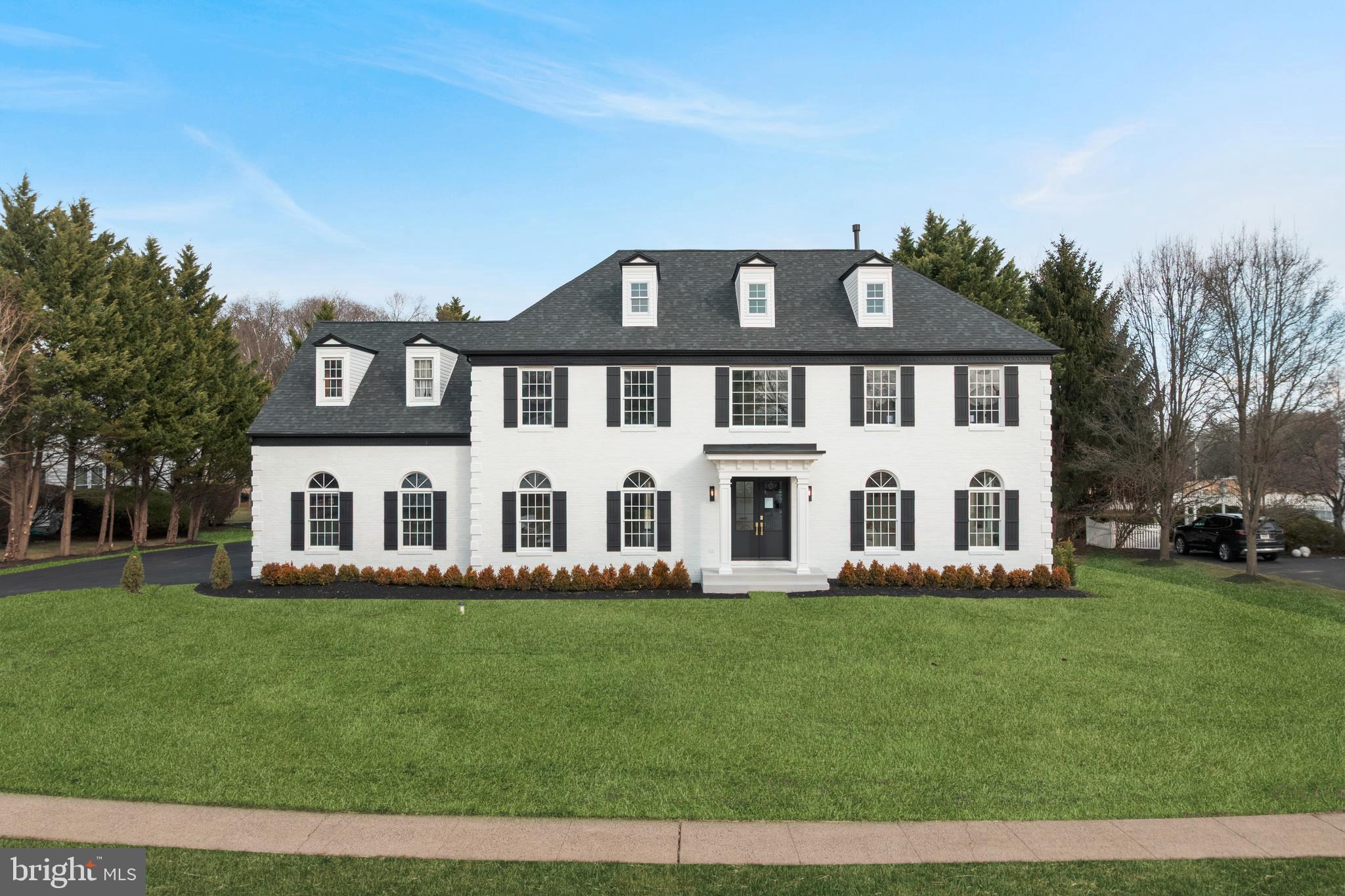 An Extraordinary Offering in Lower Makefield Township. Welcome to 1586 Brookfield Road, a truly exceptional residence unlike anything currently available on the market. This impeccably redesigned luxury home offers nearly 6,000 square feet of refined living space and boasts over $650,000 in premier upgrades, thoughtfully curated from top to bottom. From the moment you arrive, the home makes a striking first impression. Step into a grand foyer highlighted by soaring ceilings, an exquisite statement chandelier, and a fully custom staircase adorned with elegant spindles and detailed crown molding—setting the tone for the craftsmanship found throughout. The main level is perfectly designed for both everyday living and elevated entertaining. It features a sophisticated living room, formal dining room, private professional office, bonus room, and a well-appointed powder room. The heart of the home is the show-stopping gourmet kitchen, complete with top-of-the-line stainless steel appliances, two-tone custom cabinetry, designer backsplash, pot filler, built-in microwave, double ovens, oversized refrigerator, and extensive recessed lighting. Enhancing the experience further is a stylish wet bar, making entertaining effortless and unforgettable. The adjoining family room showcases a sleek electric marble fireplace, creating a warm yet modern ambiance. The second level offers four generously sized bedrooms and three full bathrooms. The primary suite is a true retreat, featuring dual walk-in closets, a private sitting area, and a spa-inspired bathroom that exudes luxury. Highlights include a massive frameless glass shower, dual-sink vanity, soaking tub, and private water closet—no detail overlooked. Additional bedrooms are equally impressive, including a stunning princess suite with its own ensuite bathroom, all finished with premium tile work and custom details. The third level provides versatile additional living space—affectionately referred to as the “tree house.” Ideal for a playroom, private office, creative studio, or additional storage, this space offers endless flexibility. The fully finished lower level adds approximately 1,650 square feet of additional living area, featuring a spacious media room, storage, and limitless potential for recreation, fitness, or guest accommodations. Significant upgrades include a new deck, all-new bathrooms, new kitchen, new flooring, new HVAC system, upgraded lighting, fresh interior paint, epoxy-finished garage flooring, upgraded driveway, professional landscaping, and an exterior patio off the deck—just to name a few. Homes of this caliber—fully renovated to this standard—are rarely found at this price point in Bucks County. Ideally located in northern Yardley at the crossroads of Newtown, Upper Makefield, and Lower Makefield, this residence offers an exceptional lifestyle. Enjoy the charm of Yardley, where living is refined, commuting is effortless, and culture and history are at your doorstep. Minutes from Yardley, Newtown, and New Hope, the location provides seamless access to I-295 and Route 1, making travel to Philadelphia simple, while New York City is easily reachable via the Garden State Parkway or regional rail. This home perfectly balances privacy, luxury, and convenience. A rare opportunity to own a fully transformed masterpiece—this exceptional property will not last.  Nestled on a gorgeous lot backing to preserved farmland, creating a peaceful and private setting. Schedule your private showing today and experience it for yourself.