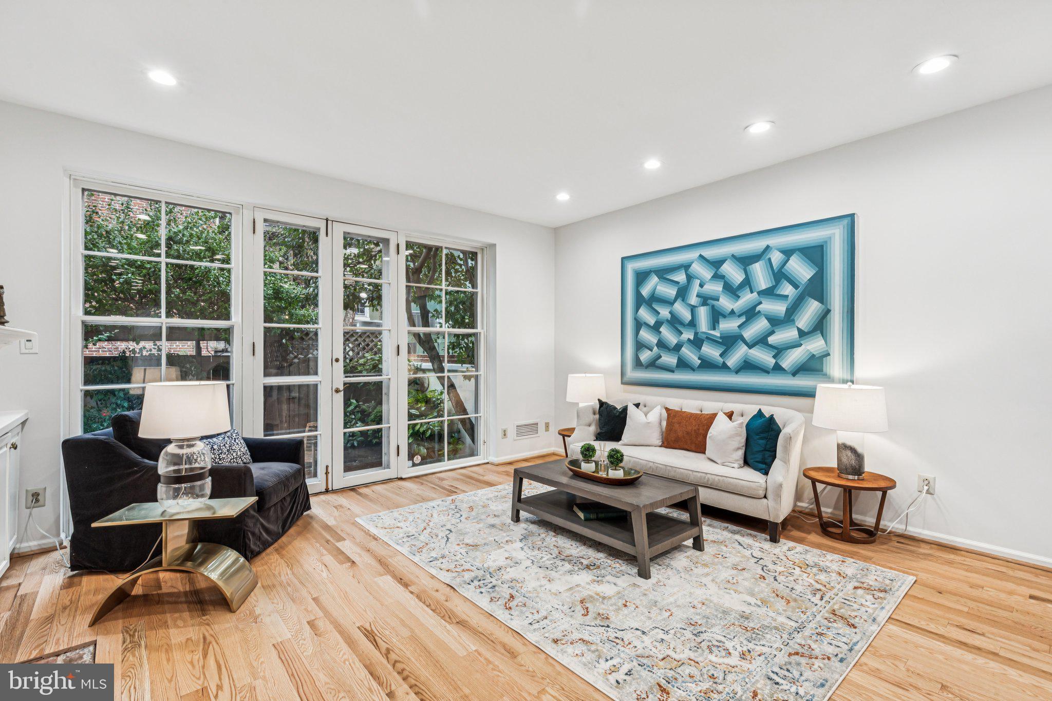 Set within the charming enclave of Blackwell Place—an intimate collection of Colonial-style homes arranged around a beautifully landscaped community lawn—this 3-bedroom, 3-story townhome offers a rare blend of privacy, character, and convenience in the heart of Society Hill, complete with the added benefit of licensed garage parking for one car.

A gracious foyer welcomes you into a spacious open living and dining area designed for both everyday living and effortless entertaining. Anchored by built-in shelving and a gas fireplace, the space is filled with natural light and highlighted by oak hardwood flooring throughout. A glass wall of French doors leads to a private rear garden patio—a rare private outdoor space ideal for morning coffee, quiet relaxation, or intimate gatherings.  

At the front of the home, the thoughtfully designed kitchen combines style and function with granite countertops, stainless steel appliances, a Viking six-burner range, and solid wood cabinetry. A discreet powder room adds convenience to the main living level. 

Upstairs, the second floor features a flexible rear room currently configured as a sitting area with built-in shelving—perfect for a den, home office, or guest retreat. A dedicated laundry room on this level adds everyday ease. At the front, a spacious bedroom suite includes an ensuite bathroom and two well-sized closets. 

The third floor offers two additional bedrooms and abundant storage. The rear bedroom features built-in shelving, recessed lighting, and a mini-split system for efficient climate control. Three hallway closets provide additional storage options. At the front, the primary suite serves as a peaceful retreat with an ensuite tiled bath featuring a glass-enclosed shower and a separate soaking tub with handheld wand—an ideal place to unwind at the end of the day. 

The finished lower level adds versatility, with ample storage including two large closets and flexible space well suited for hobbies, organization, or additional living needs, along with dedicated mechanical and storage areas. Additional improvements includes a newer roof installed in 2015, providing added peace of mind. The home is also located within the sought-after McCall School catchment.  

Tucked away in Society Hill, residents enjoy the architecture and character of one of Philadelphia’s most treasured neighborhoods. Just moments away are the boutiques of Fourth Street’s Fabric Row, the vibrant shops and dining along South Street, and the galleries and cafés of Old City. Commuting is effortless with convenient access to multiple SEPTA routes, I-95, and the Ben Franklin Bridge.

Garage parking included.
A rare convenience in Society Hill.

A refined blend of character, comfort, and location—this is Society Hill living at its finest.