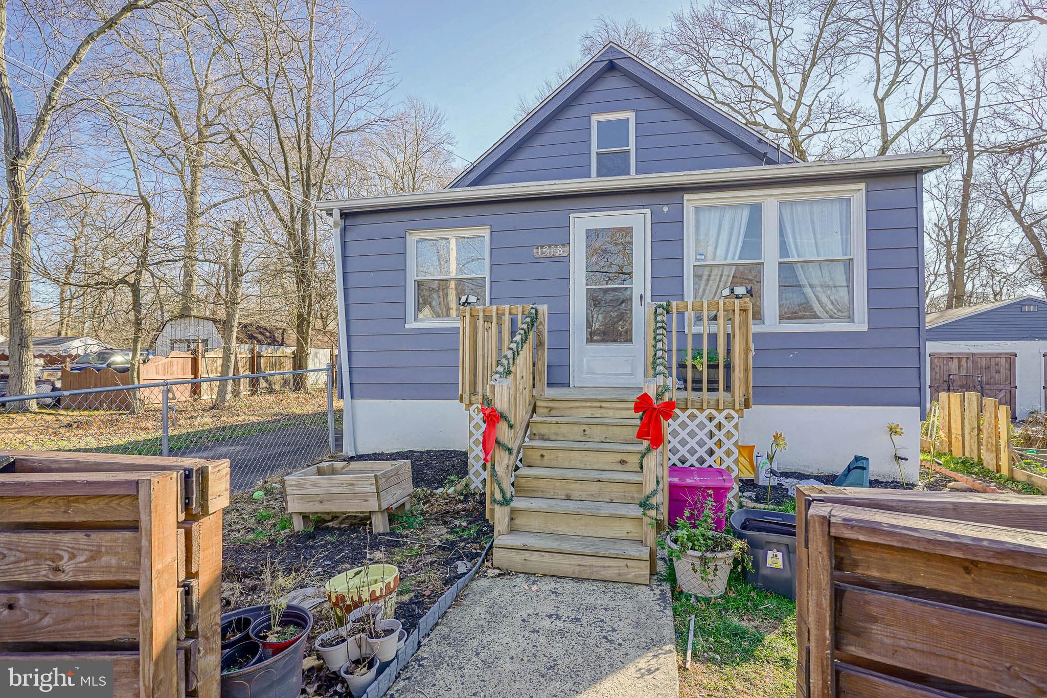 No way! The wow factor has been activated! Welcome to 1318 Miller Ave in Croydon. This home has 3 bedrooms and 1 full bathroom and it is purely awesome! Let me explain why. When you first turn the corner and enter the street, you will notice the beautiful wooden fencing that surrounds the side yard of the property. Do you need parking? How bout extra parking? Well this place has an abundance of parking! You and your guests can park all along that wooden fence out front. Plus there is the official driveway which is to the left of the house and that can park at least 2 cars there. Lets step inside. Walking inside you will first enter a spacious mud room. Super great for coats, shoes, a bench.(especially during these snow storms) It already has custom shelves and a place for hanging coats. Then into the first floor a very spacious living room. There is space to add a dining room area if you would prefer it. Then around the corner will be the main bedroom on the first floor. It is a nice large size and has the space to design it how you like.  Main hall bathroom is spacious and delightful. It was newly installed just a few years ago. Then past the living room is the large and  bright eat-in-kitchen. The kitchen has tons of cabinet and counter space.  It was also newly installed just a few years ago. Beautiful counters and backsplash. Door from kitchen then leads you out to the deck out back. It is the perfect size deck and it can be thoroughly enjoyed this spring! The 2nd bedroom is also tucked away around the corner of a hall way on the first floor. Then we go upstairs. The 2nd floor is one large bedroom. But it is separated into 2 sections making the possibilities here endless. There are many options you could do with this space. What are your ideas? I'm thinking  it could be an office, a game room, a huge closet/make up area. You name it! Now lets go outside. The yard space is amazing! OMG! Where do I start?! The fenced in side yard is incredible. There is a gardening section. There is a patio area. There is a fire pit area. There is room to roam and play. A couple large trees. Then the garage building is super cool. One section of the garages is like a finished room! It could be an office, a bar area, man/woman cave, workshop, crafts space, you name it! The garage barn doors open to this room. Then the 2nd garage space is an actual garage with a garage door. The property backs up to woods, but the woods are Not part of this property. Inspections are welcome, however, the seller may not be interested in making repairs. Come and see this special property.