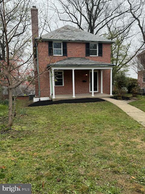 The renovations have just been completed on this traditional brick colonial home on a pretty street in Original Northwood.  Relax on the covered front porch and enjoy the scenery.  Enter the living room with fireplace and great natural lighting.  The dining room features a corner cabinet and bay window.  Updated kitchen with stainless gas range and dishwasher.  Upstairs are three comfortable bedrooms and a new full bath.  The basement features a finished area and a powder room.  The home features a gas radiant system plus a forced air system with central air.  Classic charm and a great home!  More information about the neighborhood and association are available at www.OriginalNorthwood.org.  NOTE:  The windows in this property are being replaced with new windows compliant with the requirements of the HOA.  Replacement will be completed prior to settlement.