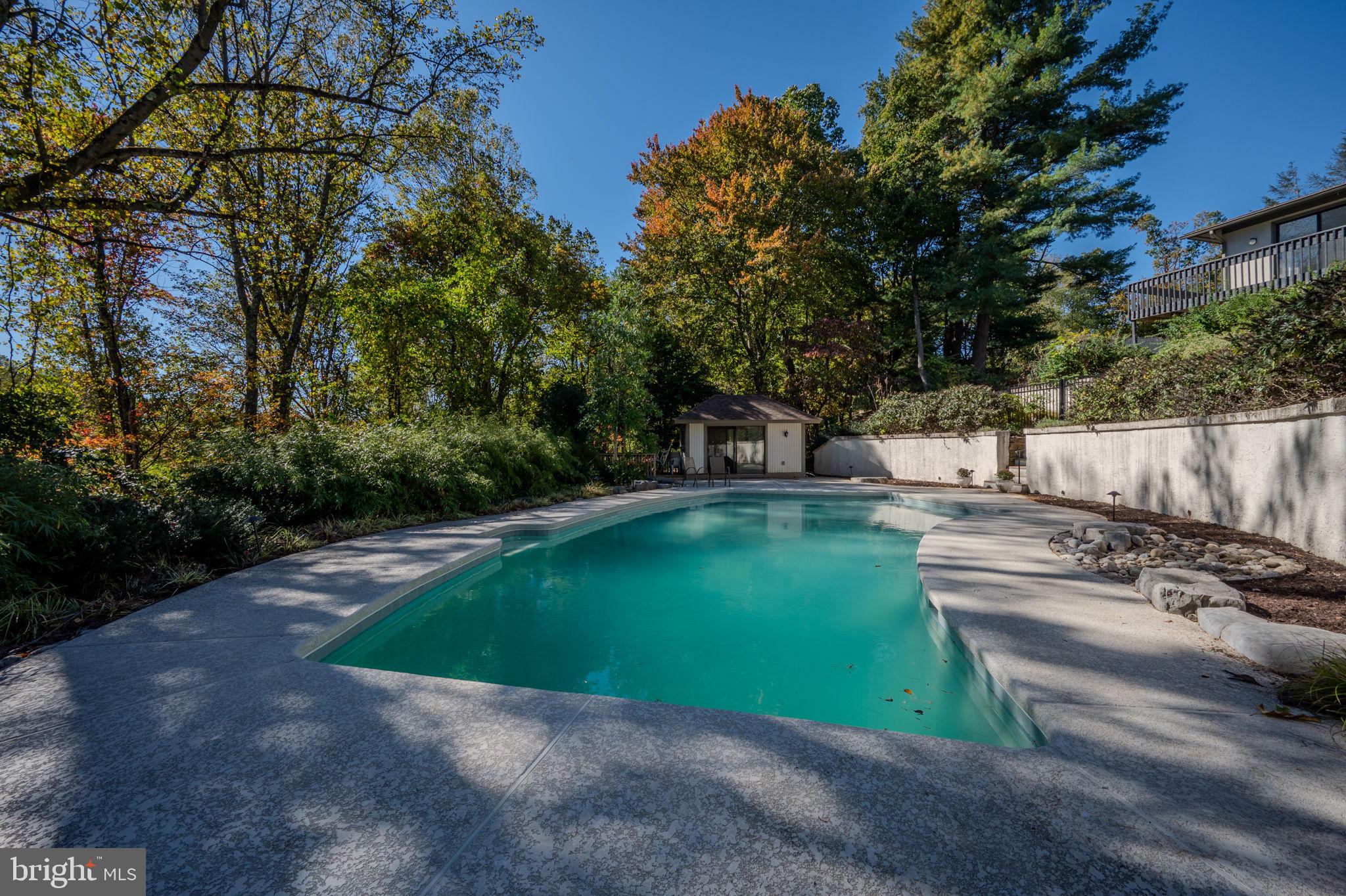 Experience refined living at 6 Southview Path, a stunning Chadds Ford residence offering exceptional versatility and modern elegance. Thoughtfully reimagined in 2023 & 2024, this 6-bedroom, 4.5-bath, 3 car garage home lives like two houses in one—perfect for multigenerational living or flexible guest accommodations. Designed for elegant entertaining yet intimate everyday living in the heart of Chadds Ford.
Step inside to a bright, open layout featuring new light fixtures, recessed lighting, and fresh neutral paint throughout. The gourmet main kitchen showcases custom cabinetry, granite countertops, Sub-Zero refrigerator, stainless steel appliances, and a wine refrigerator. Tile flooring warms up from ductwork under adds comfort in cooler months, while the spacious pantry and main-level laundry room enhance functionality. A wood-burning fireplace and new powder room complete the inviting main floor.

The primary suite is a private retreat with a walk-in closet, jetted soaking tub, tiled shower, and makeup/dressing area framed by panoramic windows. Two additional generous bedrooms and a fully renovated hall bath complete the upper level. Step out from the kitchen onto a screened-in deck overlooking the scenic backyard and glistening in-ground pool—a perfect setting for outdoor relaxation and entertaining.

The lower level offers a completely renovated living space with luxury vinyl plank flooring, mix with carpet, a modern kitchen with granite counters and dining area, living room with the wood-burning fireplace, 3 bedrooms, a 2 new full bath with walk-in shower, and its own laundry room. Sliding doors open to a stamped-concrete patio that leads to the pool, cabana, and beautifully landscaped yard.

Additional highlights include two separate heating systems, water heaters, and new oil tanks for upper and lower levels, plus a separate garage, workshop, and ample storage.

Enjoy timeless design, high-end finishes, and unmatched flexibility—all in the desirable Chadds Ford area with sought after Unionville-Chadds Ford Schools.