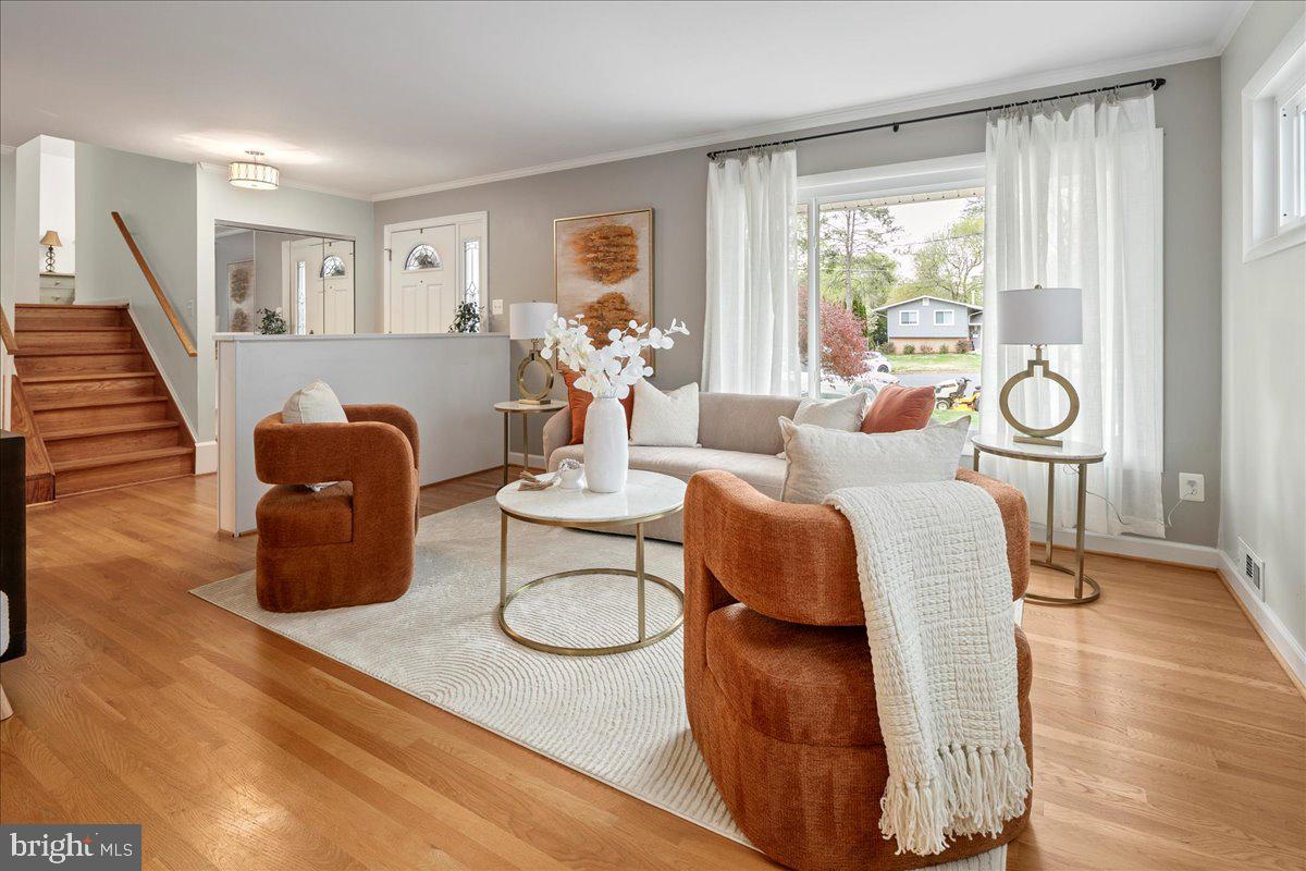 Situated on a quiet cul-de-sac, this is the one you've been waiting for! Step inside where you’ll find the absolute pride of ownership. The living room has a wood-burning stove that’s ready to keep you warm on chilly evenings, turning ordinary evenings into cozy retreats. The primary bedroom is exceptionally large and complete with an en suite bathroom! The updated lower level has a spacious living area, bedroom, and half bath perfect for guests or an extension of your upstairs living. The screened-in porch makes for a lovely entertaining space in rain or shine! Outdoor living at its finest, the private and sprawling backyard is the perfect spot for hosting a BBQ with friends and provides just the right amount of sun and shade. Gather around the fire pit to enjoy a brisk fall evening gazing at the stars or have a relaxing soak in the hot tub after a long day. The spacious two-car garage has plenty of room for both of your vehicles and storage. The shed conveys so you can store tools and yard equipment. New landscaping, new roof, gutters, and windows (2021), new hot tub (2023) and new refrigerator (2024). Minutes to Fair Oaks Mall, Old Town Fairfax, all of your favorite restaurants, parks, and much more! Welcome Home!