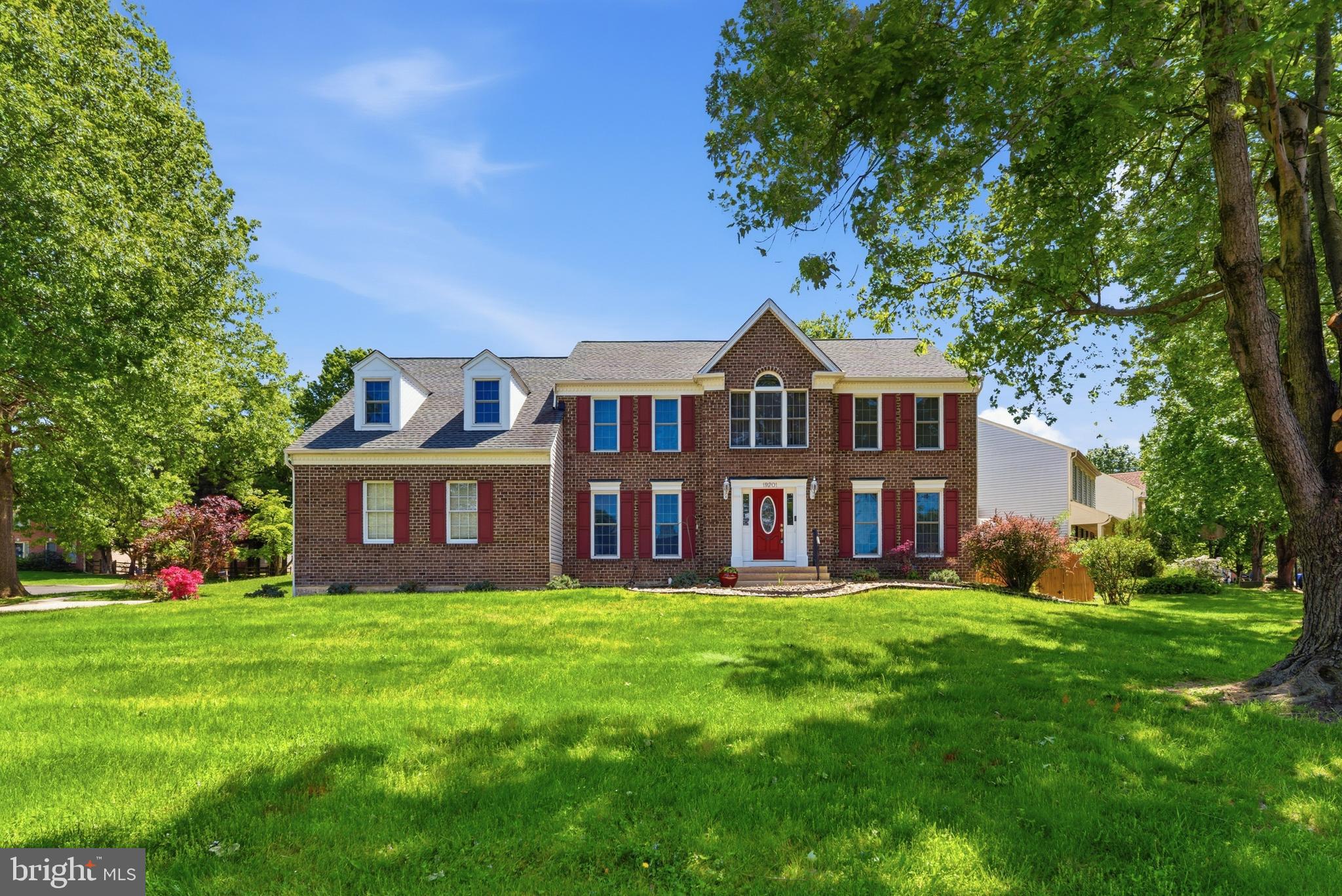 Welcome to this beautiful brick-front colonial perfectly positioned on a corner lot in a desirable, quiet setting close to shopping and near parks. From the moment you step inside, the grand two-story foyer sets the tone, opening to an oversized dining room that is perfect for hosting gatherings both large and small.

The updated gourmet kitchen features granite countertops and stainless steel appliances and flows effortlessly into the sunken family room, where vaulted ceilings, skylights, and a custom fireplace create a bright and inviting space to relax or entertain.

Upstairs, the spacious primary suite offers a true retreat, complete with a well-appointed luxury bath designed for comfort and relaxation.

The fully finished lower level takes this home to the next level, offering incredible flexibility and entertainment options. Enjoy a dedicated home theater room, a second full kitchen, wet bar, recreation area, private home gym, and additional bonus space that can easily adapt to your needs.

This home is loaded with thoughtful upgrades, including a roof and 13.5 kW solar panel system (2019), new windows (2020), roof insulation and gutter covers (2022), a new driveway and walkway (2023), and numerous recent updates through 2026, giving peace of mind for years to come.

All of this in a commuter-friendly location just minutes from I-270, with easy access to shopping, dining, and outdoor recreation at Seneca Creek State Park.