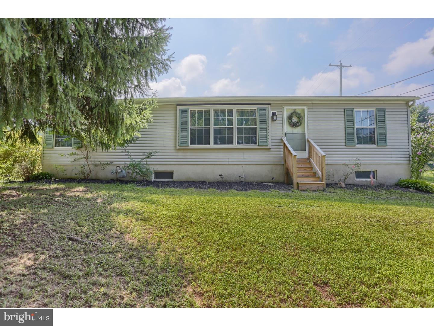 Attractive single Rancher style home. Large open floor plan with vaulted ceilings. Generous sized living room, opens into a 39 handle kitchen with breakfast bar area for extra seating. New gas stove is  a nice addition to this spacious kitchen. Homes offers 3 bedrooms and 2 full. Property sits on over a half acre with 2 outbuildings. You can enjoy the convenience of living in town but feel the privacy all at the same time.