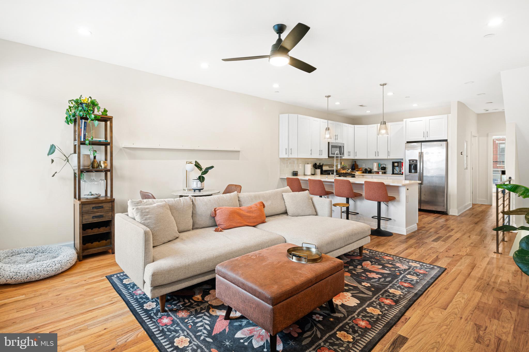 Welcome to 1215 N 5th St #2, a stunning bi-level condo offering 3 bedrooms and 3 full bathrooms in the heart of Northern Liberties and Olde Kensington.

This sun-drenched residence features soaring ceilings, rich hardwood floors, and expansive living spaces designed for both everyday comfort and effortless entertaining. The open concept kitchen is anchored by newly updated countertops and complemented by stainless steel appliances and sleek, modern finishes. Thanks to unobstructed exposures and a smart, functional layout, natural light pours into the home year-round.

All three bedrooms are generously sized, including a spacious primary suite complete with a walk-in closet and private en-suite bath. With three full bathrooms, this home offers flexibility and convenience for guests, family, or a home office setup.

Step outside to your private rooftop deck and take in sweeping skyline views. The perfect setting for morning coffee, sunset relaxation, or hosting friends. Additional highlights include in-unit laundry, dedicated assigned parking, a private dog park, and years remaining on the tax abatement for added peace of mind.

Ideally situated just steps from both Northern Liberties and Fishtown, you’ll enjoy easy access to some of the city’s best restaurants, coffee shops, and breweries, including, including Suraya, Yanaga Kappo Izakaya, Kalaya, The Kettle Black, Federal Donuts, La Colombe, Jaffa Bar, Human Robot Brewery, Evil Genius, and Wissahickon Brewing Company. Nearby green spaces such as Liberty Lands and Palmer Park provide plenty of room to relax, play, or unwind.

With quick access to Center City, South Jersey, and I-95, this prime location makes commuting seamless while keeping you close to everything the Greater Philadelphia area has to offer.