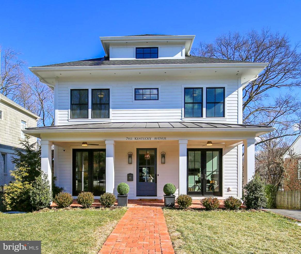 Presenting 7911 Kentucky Ave, East Bethesda's most charming Modern Farmhouse!  No detail has been overlooked in this luxurious 6 bedroom / 5.5 bath home featuring over 5,500 SF of living space on 4 levels, along with an attached one-car garage. You'll fall in love with the brushed gold finishes, gleaming hardwood floors, soaring ceilings, and elegant design throughout.  The gourmet kitchen is a chef’s dream with state-of-the-art stainless steel appliances, custom cabinetry, a large center island, and gorgeous quartz countertops. Don’t miss the splendid walk-in pantry with extra cabinetry for superb organization and space for an additional beverage fridge. The kitchen opens to a spacious family room with a gas fireplace and double French doors that lead to a serene deck – perfect for entertaining outdoors.  Adjacent to the kitchen & family room is a large formal dining room with plenty of space for the whole family to gather.  Light pours into the main level home office and chic formal living room.  Also on the main level is a terrific mud room and 1 of 2 laundry rooms, as well as a powder room.  Make your way upstairs to find a peaceful owner’s suite with lovely, tree-lined views, large walk-in closet, and spa-like bath outfitted with designer tile, dual vanity, quartz countertops, a soaking tub, and separate shower. Three more sizable bedrooms, two more full bathrooms, linen closet, and convenient 2nd laundry room complete the second level. The third level offers great flex space –  perfect for a 2nd home office, home schooling or recreation, along with one more en-suite bedroom w/ full bath. The walk out lower level is a great place for the family to lounge featuring a spacious rec room w/ wet bar & kitchenette, high ceilings, and French doors leading to a brick patio & fenced backyard. Also on the lower level is a fantastic in-law suite with full bathroom, access to the 1-car garage, and amazing storage. Located in the coveted BCC school district and blocks to downtown Bethesda Metro, shopping, restaurants, parks & more – this house the perfect 10!