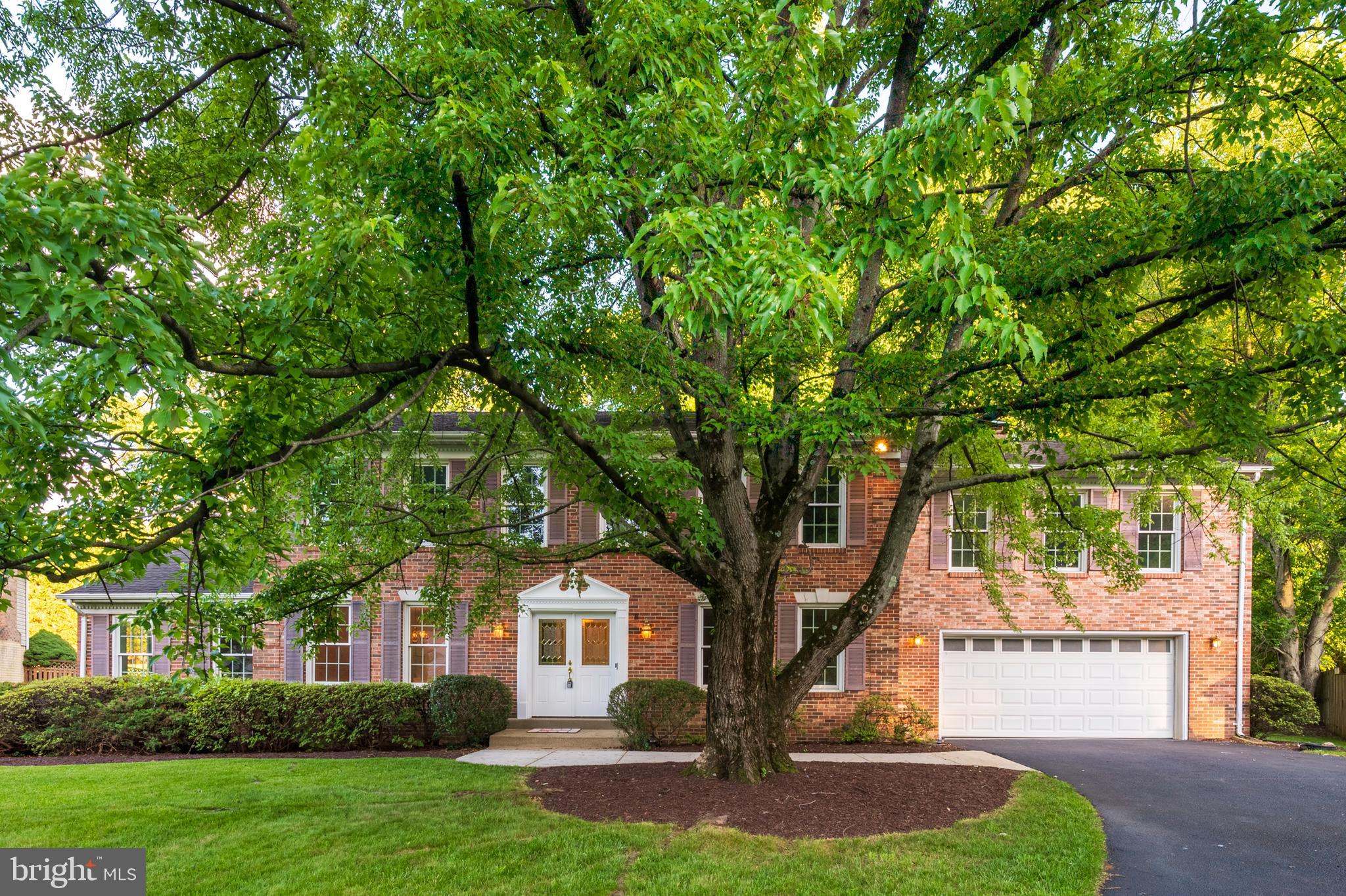 Grand Colonial Living on a Beautiful .90 Acre Lot ... 

Set on an impressive .90 acre lot in Bowie, this expansive colonial offers the space you've been searching for, both inside and out. The front yard makes a memorable first impression with its sprawling lawn and magnificent mature shade tree. The fully fenced backyard is enhanced by mature landscaping and beautiful trees that have been lovingly cared for over the years.

Inside, numerous updates make this home move in ready, including fresh paint and new carpeting throughout. The renovated kitchen serves as the heart of the home, featuring white quartz countertops, stainless steel appliances, a large pantry, and plenty of workspace for meal preparation and gatherings. Just beyond the kitchen is a spacious laundry room that connects to the oversized garage, providing additional room for a workshop, hobby area, or extra storage.

The upper level offers six generously sized bedrooms, including a spacious primary suite with a private bathroom featuring a separate shower and soaking tub. Whether you need bedrooms for a large household, guest space, or home offices, there is room for everyone.

The finished lower level is truly enormous and ready for game days, celebrations, movie nights, or just everyday fun. With its expansive recreation area, there is plenty of room to spread out and enjoy. Two additional bonus rooms provide flexible space for guests, hobbies, fitness equipment, a home office, or whatever best fits your needs.

With its extensive updates, remarkable amount of living space, oversized garage, and beautiful .90 acre setting, this Bowie colonial offers room to grow, gather, and create lasting memories for years to come.