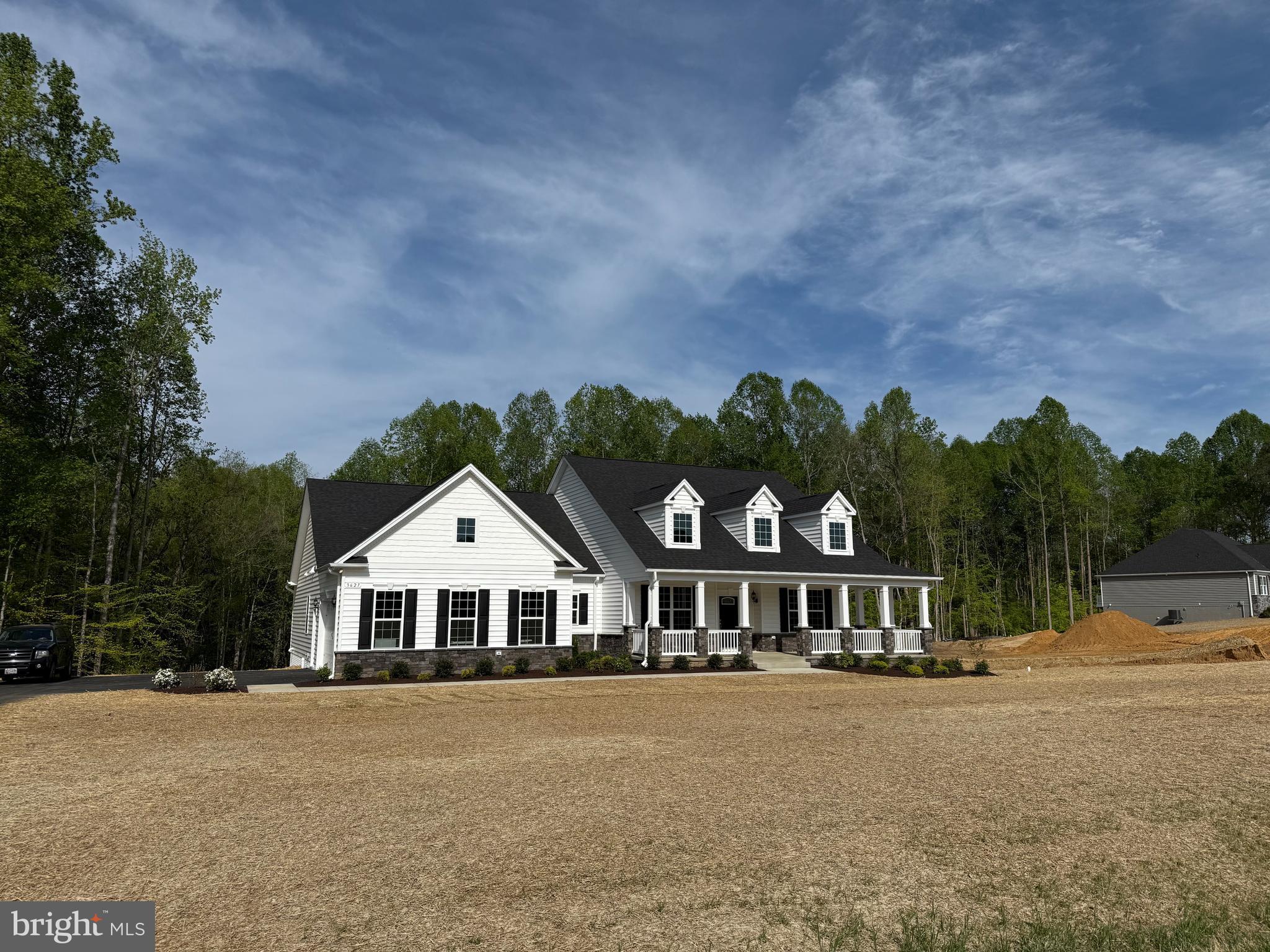 This stunning D2 Ashland sits on a beautiful 1+ acre lot in Huntingtown.  Features many upgrades on the main level such as QBHI's Grand kitchen  with double wall ovens, gas cooktop with built in microwave, large Island with pendant lighting and large pantry. Plenty of table space area with the table space area, morning room and formal dining room. Owners suite with tray ceiling, huge walk in closet and full bath with QBHI's signature deluxe shower.  Basement has a full bath, bedroom and sitting area.  Call to build your future home!