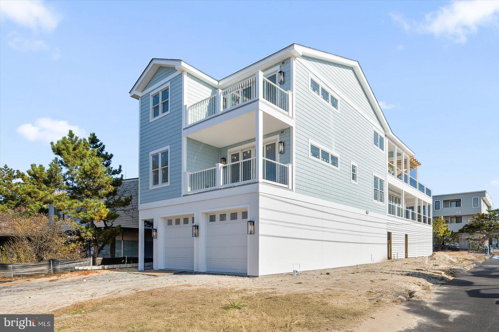 *Pre-construction photos.   Check Back for professional photography of Completed Project in the next few weeks!*

Nestled in the heart of Downtown Bethany Beach, this newly constructed 3400 square foot custom-built ocean-view home exemplifies coastal elegance with no detail overlooked and no expense spared. Situated just one property back from direct oceanfront on a coveted south corner lot, this home promises captivating  ocean views and easy access to the sandy shores of the Atlantic, and the famous Bethany Beach Boardwalk.

The design of this coastal-style residence emphasizes a blend of luxury and comfort, featuring expansive balconies on both levels that offer ample outdoor living opportunities to soak in the stunning vistas and the crisp ocean breeze. The reverse living floorplan is meticulously crafted to highlight the breathtaking ocean views, particularly from the oversized kitchen. Here, residents can enjoy the sight of the waves while entertaining around a massive island topped with striking quartz countertops and panoramic views.

This home’s interior boasts professionally designed spaces, including sprawling cathedral ceilings in the second-floor living room that enhance the sense of openness and grandeur. Each of the five spacious bedrooms is a retreat of its own, complete with custom closets. The residence houses 4.5 bathrooms, each showcasing intricate custom tile work that adds a touch of sophistication. The master suite is a sanctuary, featuring dual walk-in closets, an all-marble bathroom with a glass-encased walk-in shower, and a private soaking tub, creating a spa-like atmosphere.

Practical luxury continues with a private elevator, providing effortless access between floors, and an oversized garage large enough to store four cars, offering more than enough space for vehicles and beach gear. The ground floor includes a versatile game-room and additional storage room, with potential to add a convenient 'beach bathroom.'

The private backyard of this residence offers a serene escape, perfect for intimate gatherings or a quiet moment alone under the stars.

Living in Downtown Bethany Beach not only means residing in a stunning home but also enjoying a lifestyle enriched by local attractions and entertainment. The area is bustling with charming boutiques, gourmet restaurants, and cozy cafés that cater to every taste. The vibrant community hosts numerous events throughout the year, maintaining a small-town feel with big-city amenities.

This property’s location ensures privacy thanks to the south corner lot positioning, enhancing the infusion of natural light throughout the home and offering peace away from the neighboring properties on one side.

This remarkable home represents a rare opportunity to own a piece of paradise in Bethany Beach, where luxury meets coastal living in an unmatched setting. Whether as a primary residence or a seasonal getaway, this home is designed to deliver an exceptional living experience.