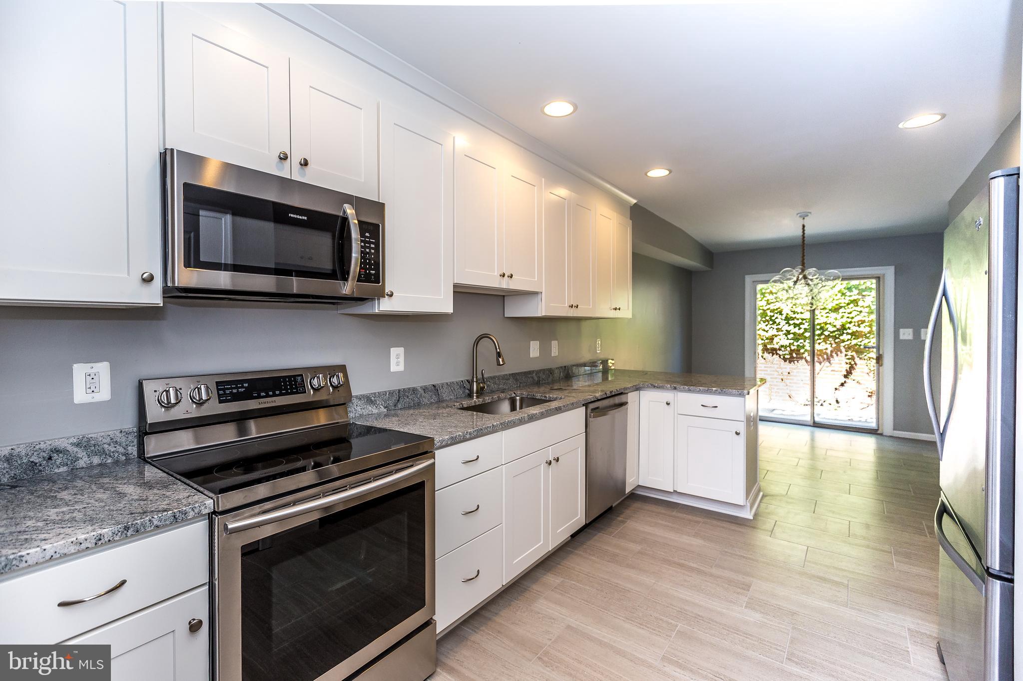 BEAUTIFUL  RENOVATED 2 BEDROOM AND DEN TOWNHOUSE WITH LOTS OF CHARM . TWO FULL BATHS, RESTORED WOOD FLOORS , FIREPLACE IN LIVING ROOM,  STAINLESS STEEL APPLIANCES IN THE KITCHEN WITH BREAKFAST ROOM WHICH LEADS TO PRIVATE PATIO .  BASEMENT WITH LOTS OF ROOM FOR EXTRA STORAGE . DECKS OFF UPPER  FLOORS WITH VIEWS OF THE CITY. WALK TO ALL THE AMENITIES FEDERAL HILL HAS TO OFFER
