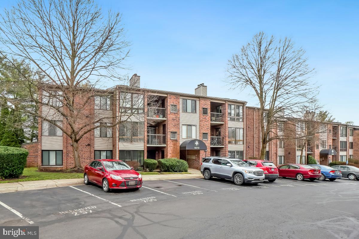 Welcome to 18010 Chalet Drive Unit 203! This property is situated within minutes to shops, restaurants, and local parks and schools. Walking distance to public transit! Enjoy over 1,100 square feet of living space with 2 bedrooms and 2 bathrooms including in-unit laundry. The property features a welcoming entry with coat closet for storage. There is an open concept living and dining room with gleaming wood flooring throughout. The living room includes a cozy fireplace and flows out to the outdoor balcony with views of the lush treeline. The dedicated dining room is large and features a wall of built-ins for additional storage. The upgraded eat-in kitchen includes stainless steel appliances, and ample cabinetry. The eat-in area has beautiful views of the community and treeline as well. The wood flooring continues throughout the bedrooms. The primary suite includes a huge walk-in closet with custom organization system and a private ensuite bath. The second bedroom is also spacious with access to the hallway full bath. There is an in-unit laundry room for added convenience as well.  As a bonus this unit comes with an assigned parking space. The community amenities including walking paths, swimming pool, and clubhouse. Don't miss out on the chance to call this one your new home!
