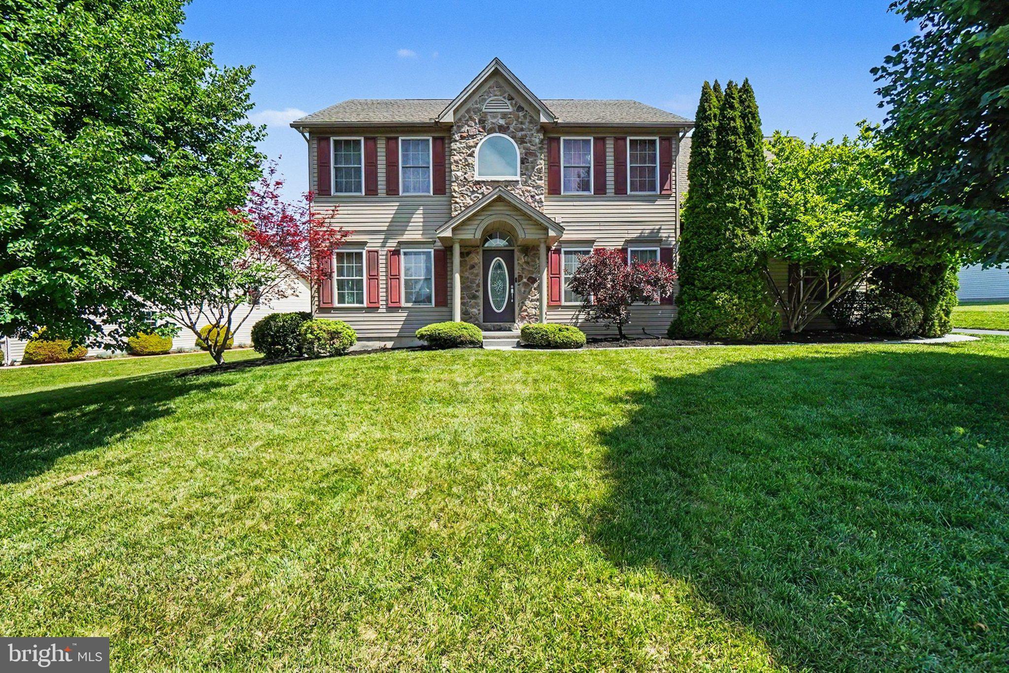 This beautiful home, built in 2006, is nestled on a quiet lot in a charming neighborhood. Step inside to discover a warm and inviting interior featuring beautiful hardwood floors throughout the open floor plan. The spacious layout includes a combination dining and living area, ideal for entertaining or relaxing with loved ones, highlighted by a cozy gas fireplace that creates the perfect gathering space. A versatile first-floor flex room offers space for a home office, study, playroom, or additional area that suits your lifestyle needs. The heart of the home is the eat-in kitchen, equipped with a built-in stainless steel microwave and gas range and an island that provides additional prep space.

Retreat to the primary suite on the second floor, complete with walk-in closets and a luxurious bathroom featuring a jetted tub and a double vanity, ensuring a spa-like experience at home. The second floor also includes three additional large bedrooms and a full bathroom.

The fully finished basement adds exceptional versatility and living space, featuring an additional bedroom and full bathroom. A dedicated entertainment area with a projector screen creates the ultimate setting for movie nights, game days, and gatherings with family and friends.

Outside, enjoy the convenience of an attached garage and ample driveway parking for guests. Relax and entertain on the patio, perfect for dining, grilling, and enjoying the backyard setting.

With abundant living space throughout, this home is designed for comfort and ease, making it the perfect sanctuary for anyone seeking a place to call their own. Don’t miss the opportunity to make this delightful residence your new home!